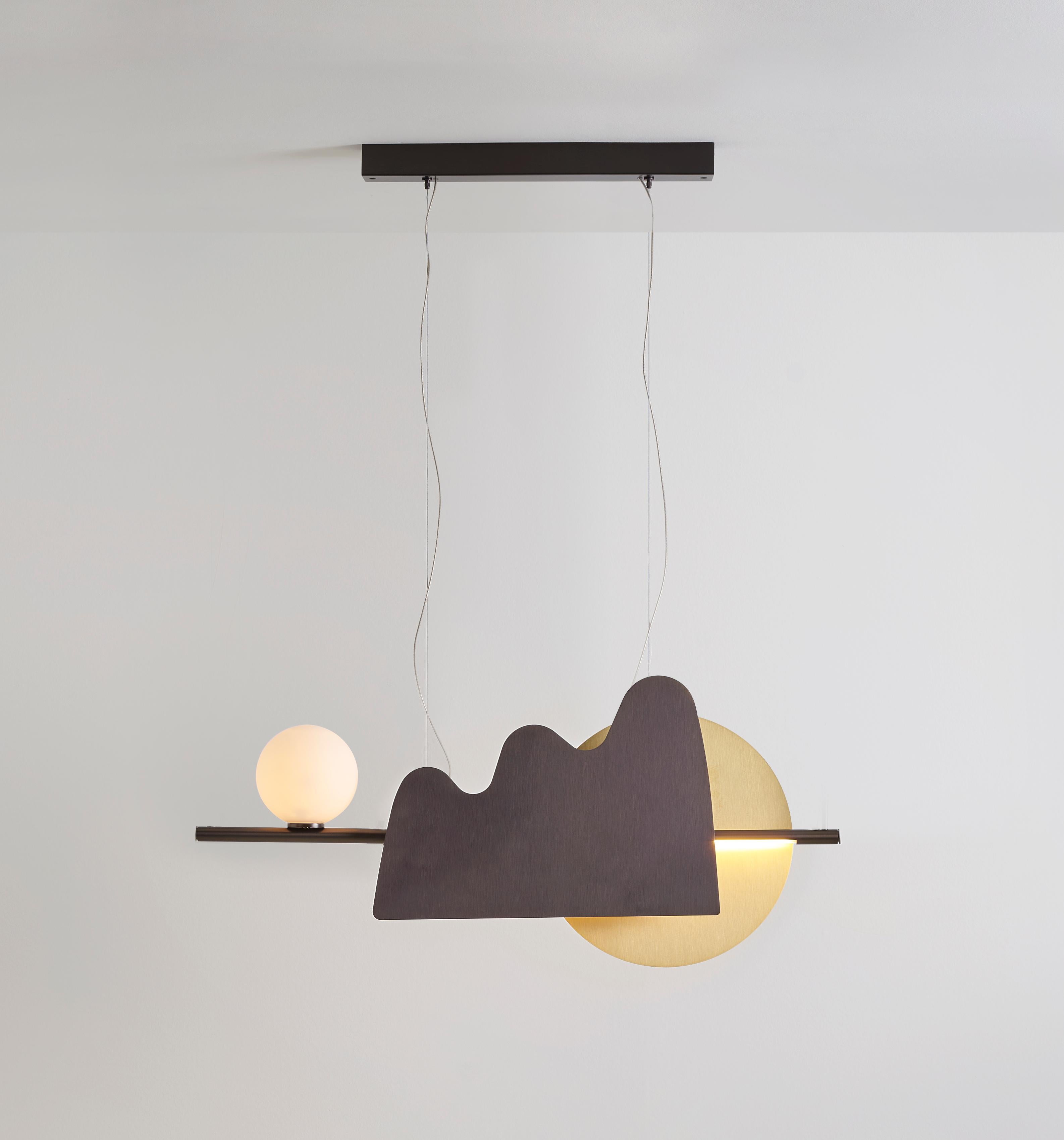 Nacho pendant by Sylvain Willenz
Dimensions: D 12 x W 130 X H 45 cm
Materials: Solid Brass, Polycarbonate, opal glass
Others finishes and dimensions are available. The height of the cables can be adjusted during installation

All our lamps can