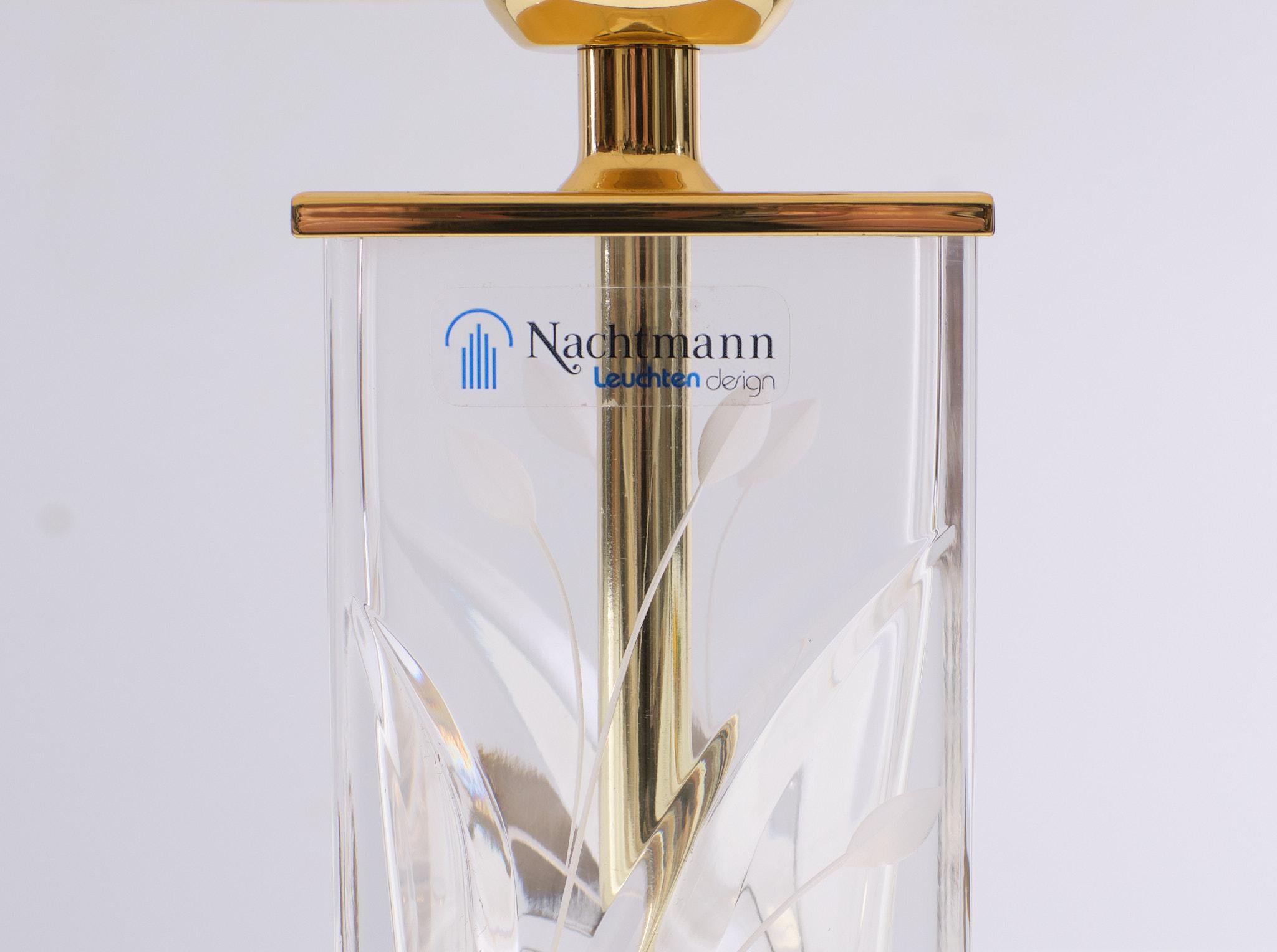 Very nice Nachtmann Leuchten ,crystal Glass table lamp ,comes with 
its original shade . Brass base fitting and details .one large E27 bulb needed .
excellent condition . signed 