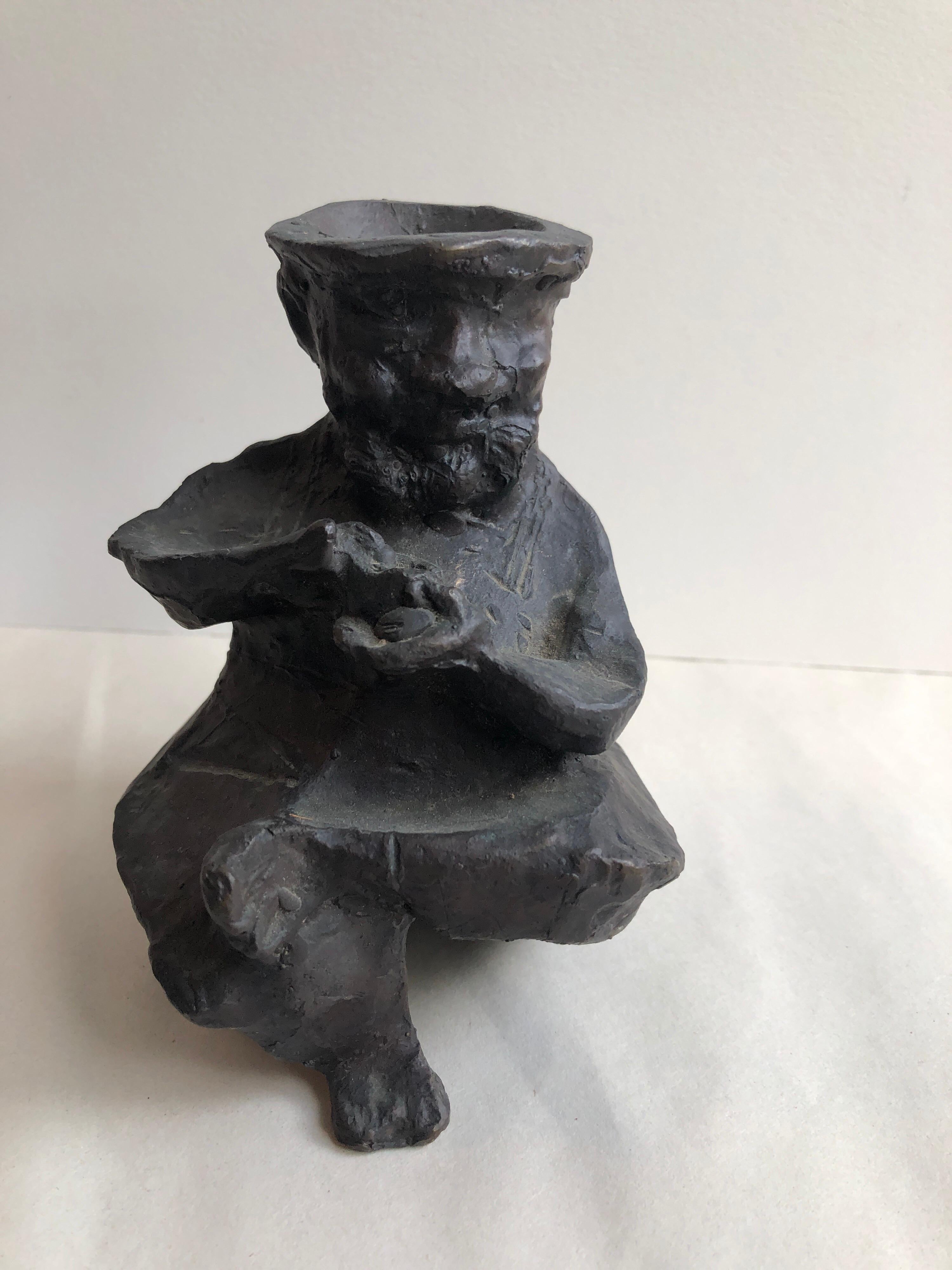 Bronze of Middle Eastern coffee drinker. Signed and numbered from edition of 100 (I don't know how many were actually cast) 

Nachum Gutman alternate spelling: Nahum Gutman; Hebrew: נחום גוטמן‎, 1898 – 1980, was an Israeli painter, sculptor, and