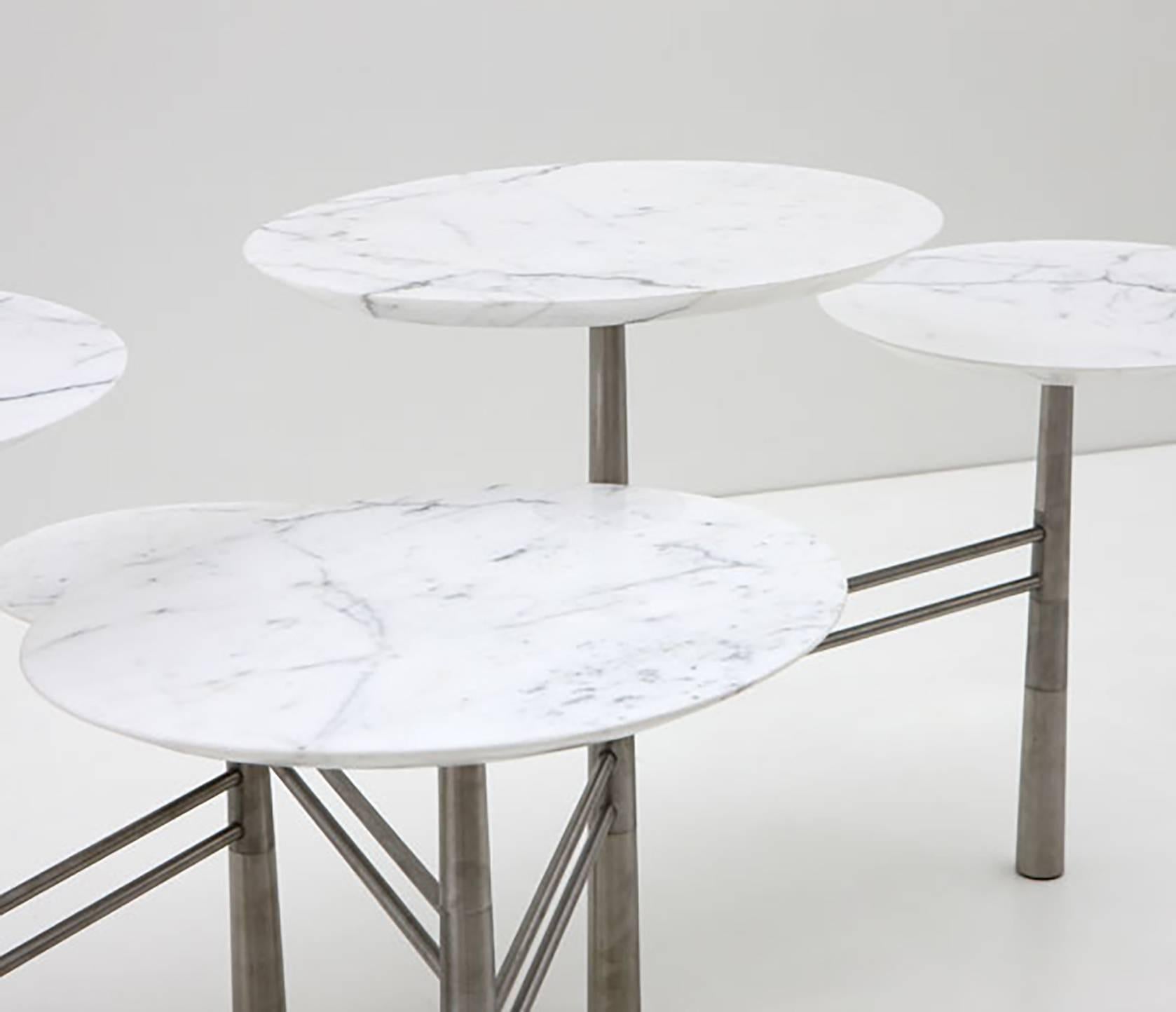 Nada Debs Pebble low table (Tapis d'Orient). Five statuarietto white marble tops on brushed stainless steel base, signed by the designer. 