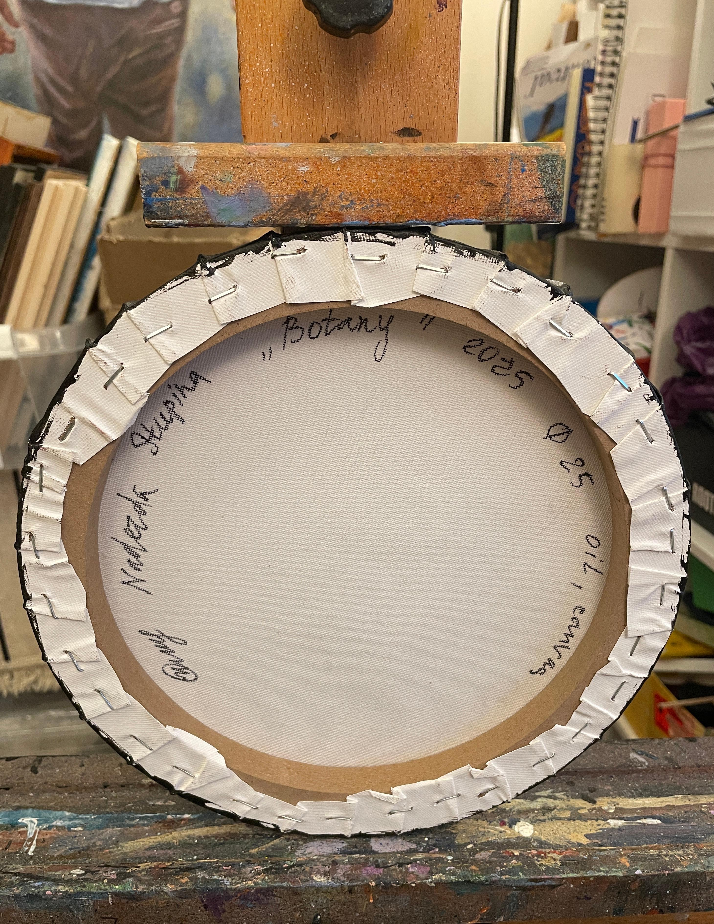 This artwork skillfully depicts a trio of hellebore flowers on a rustic, circular canvas, invoking a sense of natural elegance. The textured, earthy background accentuates the delicate, painterly detail of each flower, capturing both the vibrancy