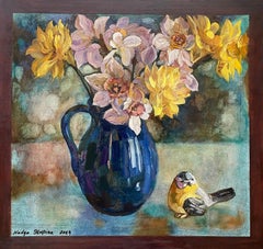 Daffodils in a blue vase