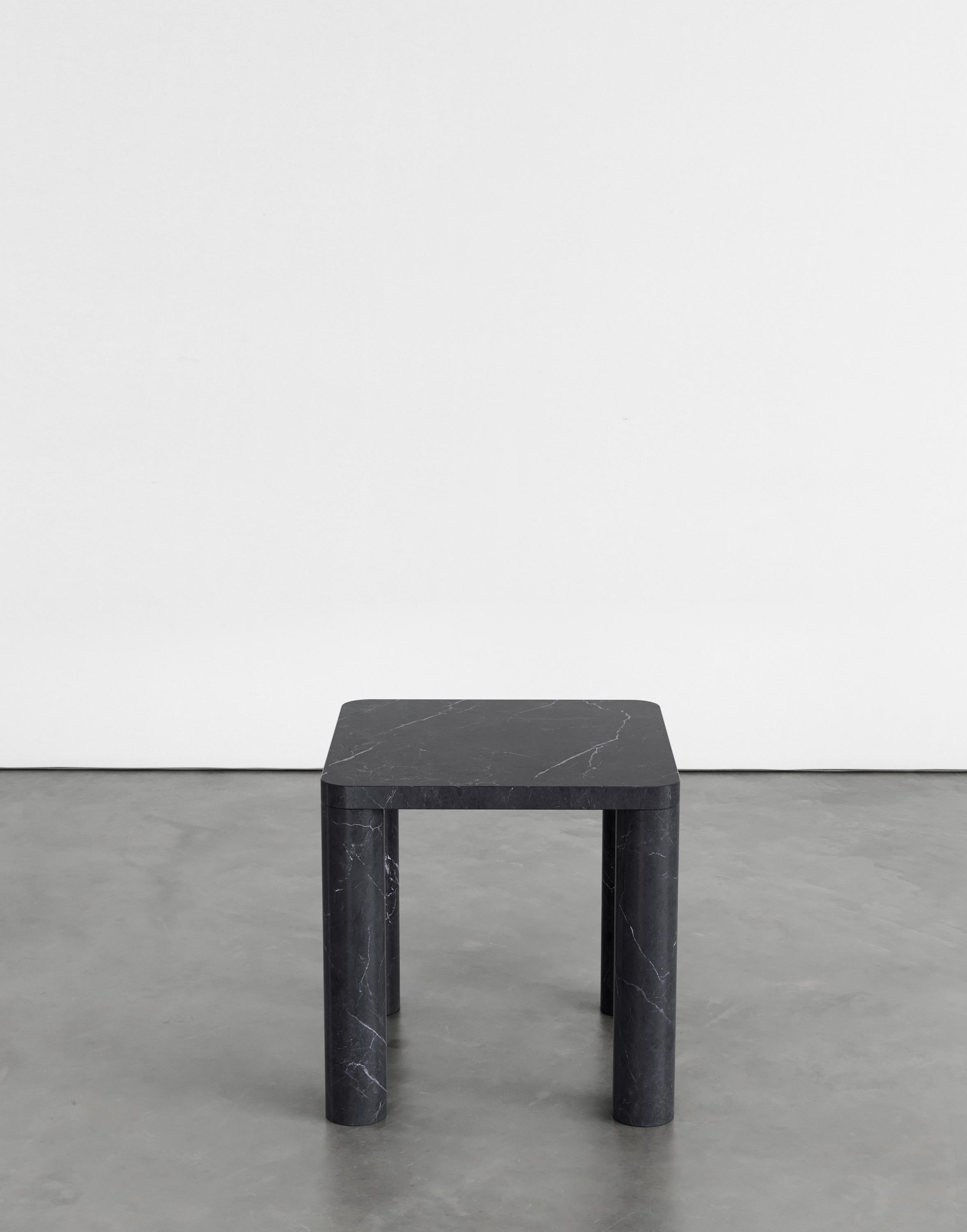 Nadia 45 side table by Agglomerati 
Dimensions: D 45 x W 45 x H 45 cm 
Materials: Black Marquina. Available in other stones. 

Agglomerati is a London-based studio creating distinctive stone furniture. Established in 2019 by Australian designer