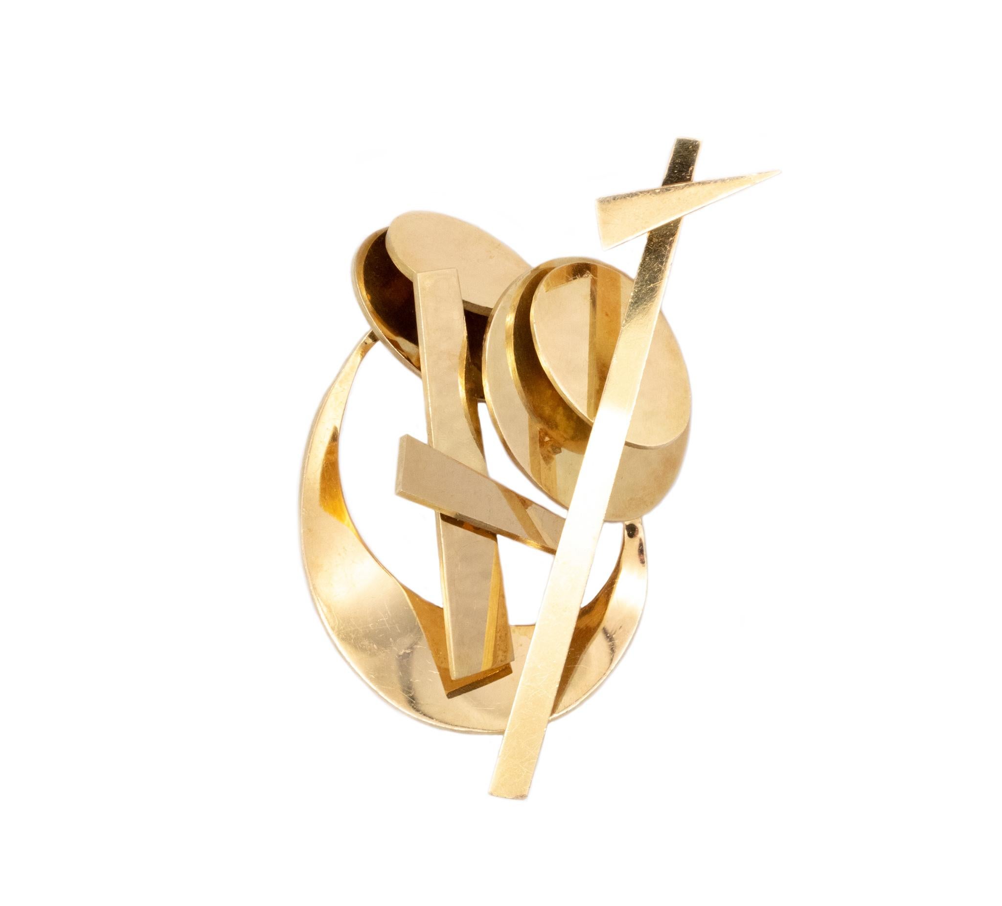Rare pendant-brooch designed by Nadia Leger (1904-1982).

A vintage geometric constructivism piece, created by Nadia Leger in Paris France, circa 1960. This sculptural piece was crafted in solid 18 karats of high polished yellow gold. Totally