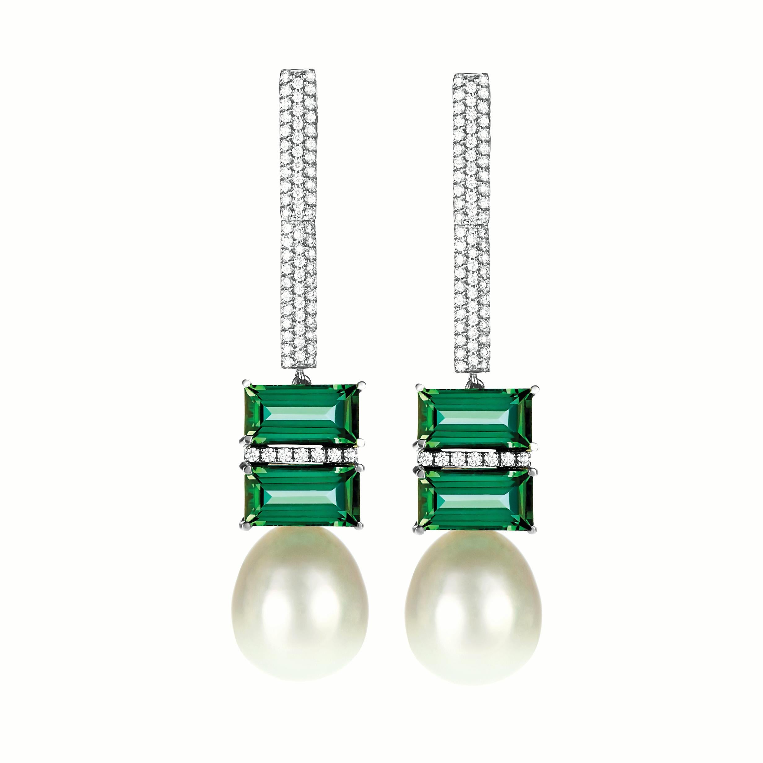 A striking suite. A between the finger double ring, with double baguette-cut green tourmalines and a South Sea Pearl, each surrounded with diamonds, and a pair of outstanding white gold and green baguette tourmaline, South Sea peal and diamond long