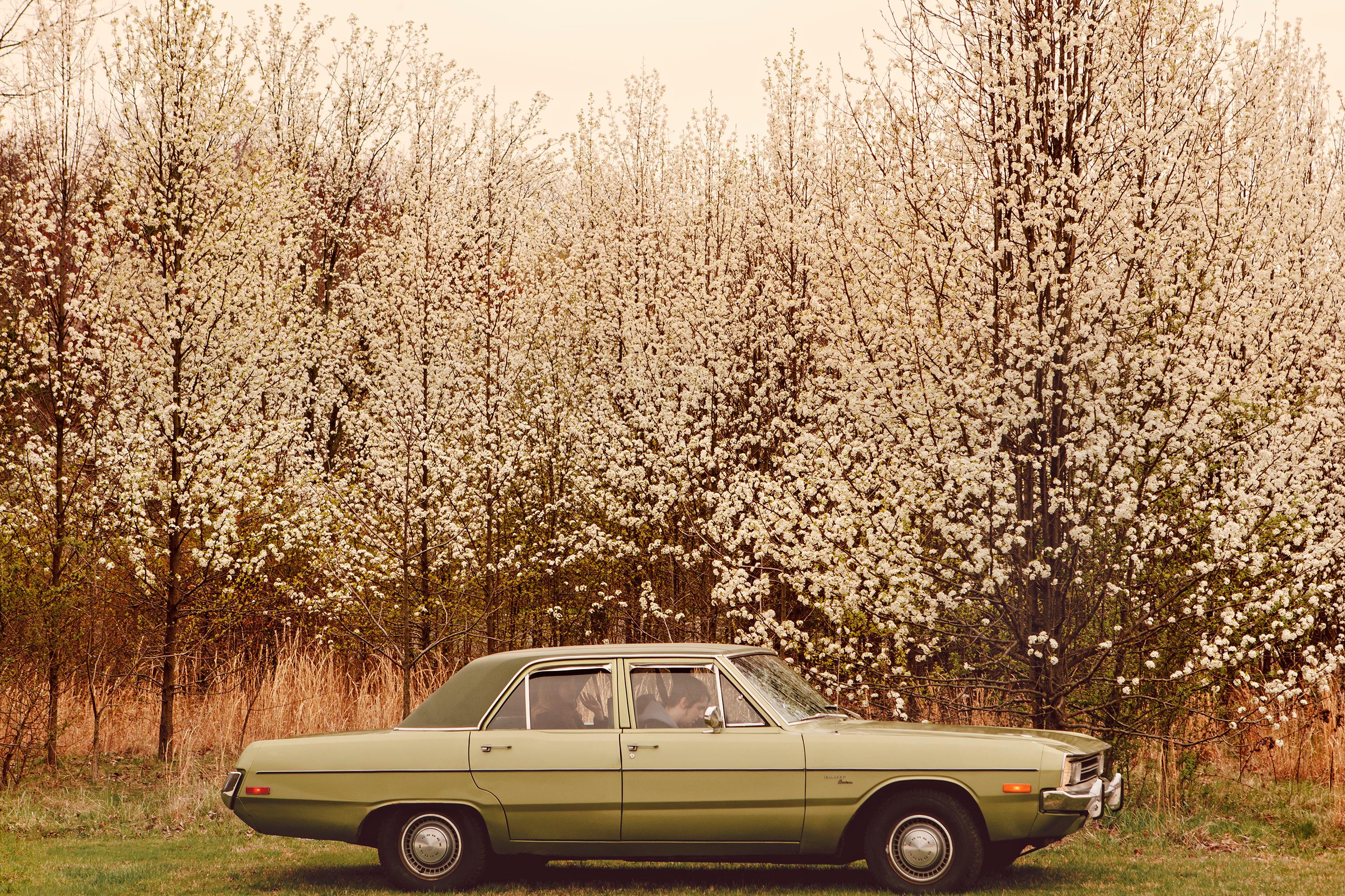 It's About Time We Go: cinematic photograph, road trip w/ classic car and trees