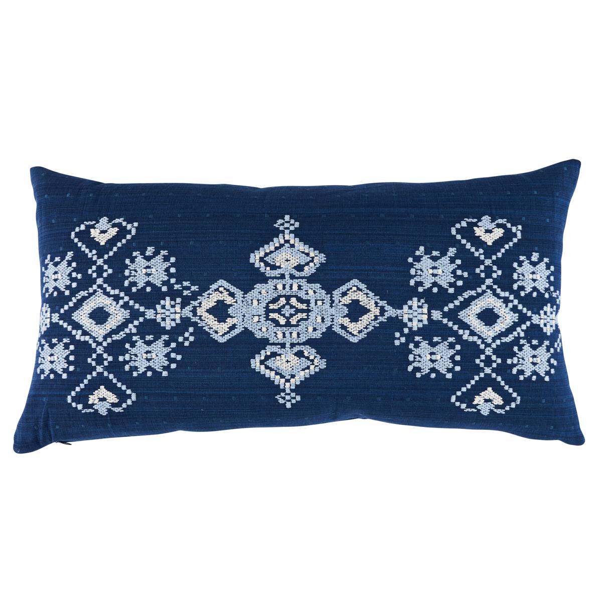 This pillow features Nadira Embroidery with a knife edge finish. Inspired by Moroccan needlework, Nadira Embroidery in indigo features a unique cross-stitch design on a cotton-linen ground. Hand-dyed yarns create a lovely strié effect, giving this