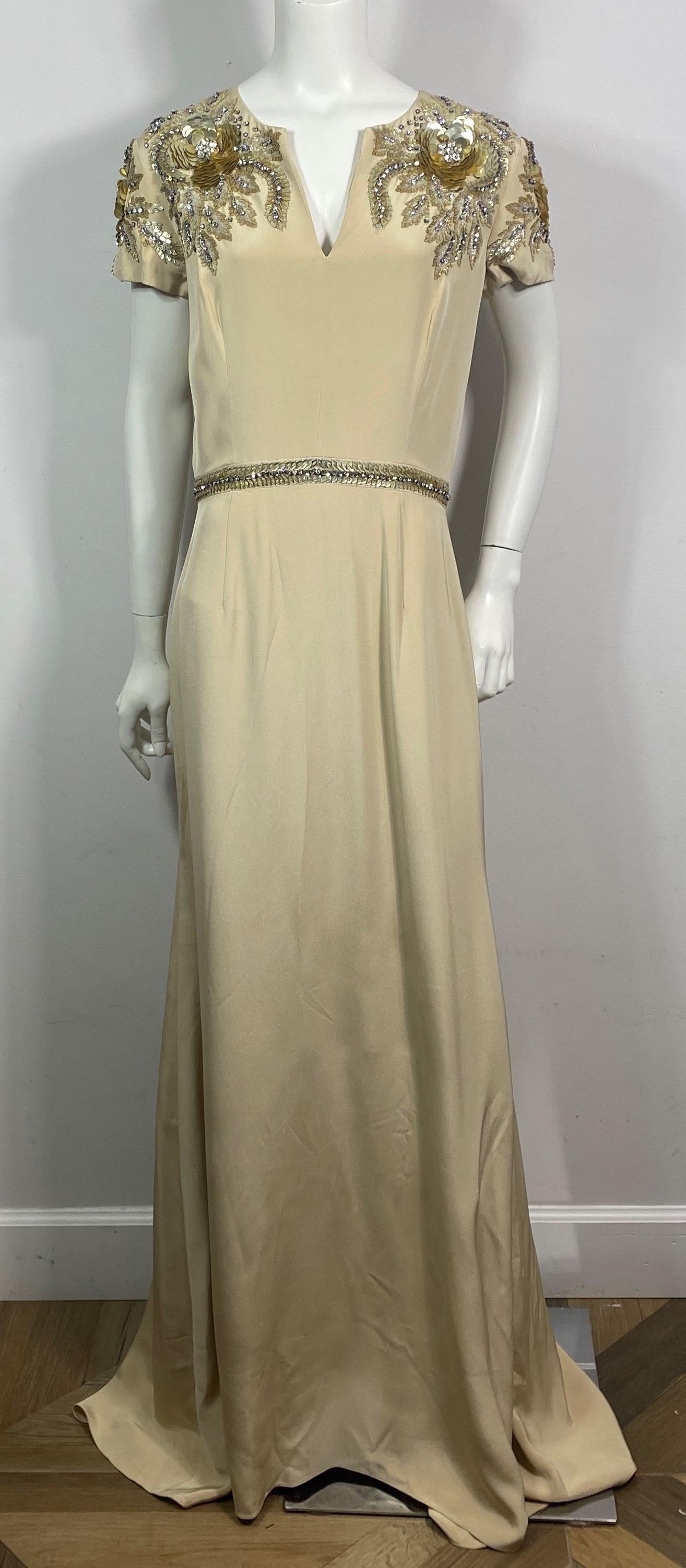 Naeem Kahn Heavily Embellished Champagne Silk Gown-Size 10  This spectacular Naeem Kahn creation is made of a wonderful champagne colored heavy silk and is lined in an additional layer of a lighter colored silk. The gown has a short cap sleeve and