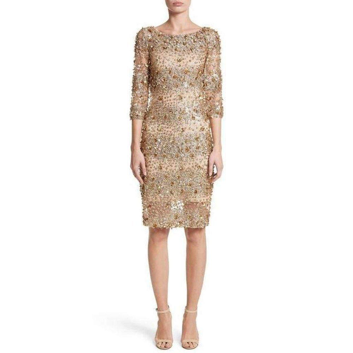 Naeem Khan cocktail dress with allover mixed beading.
Bateau neckline.
Three-quarter sleeves.
Fitted silhouette.
Hidden back zip.
Nylon; lining, silk.
Made in USA of imported material.