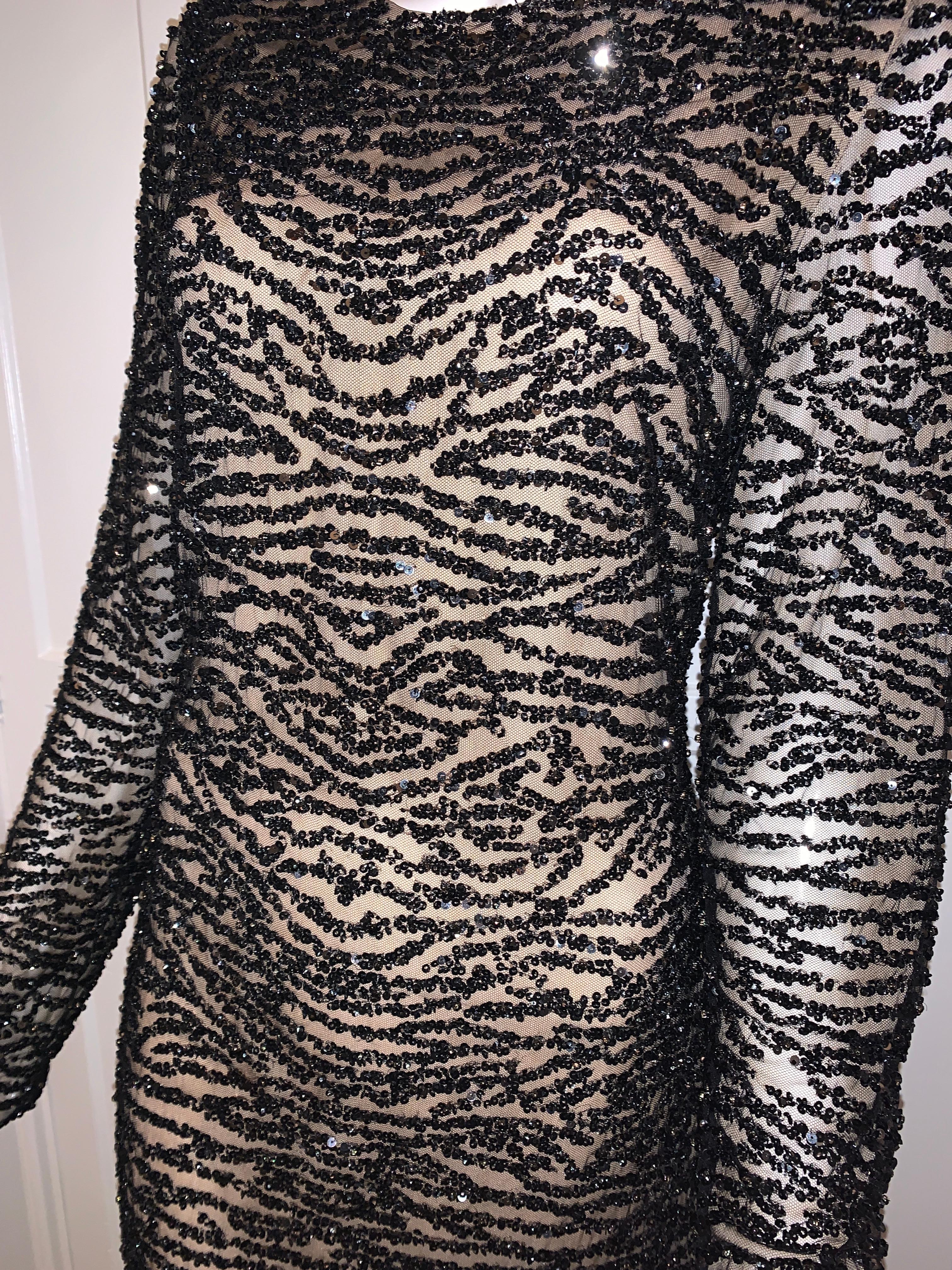 Naeem Khan Black and Cream Beaded Long Sleeve Beaded Cocktail Dress Tags still on. 
Size 12
Long Sleeve and hits below the knee
Black Beaded and Lined (not see through) 
Zipper back 
Such a glamorous, classy dress ! 

Retail $2995 + 
