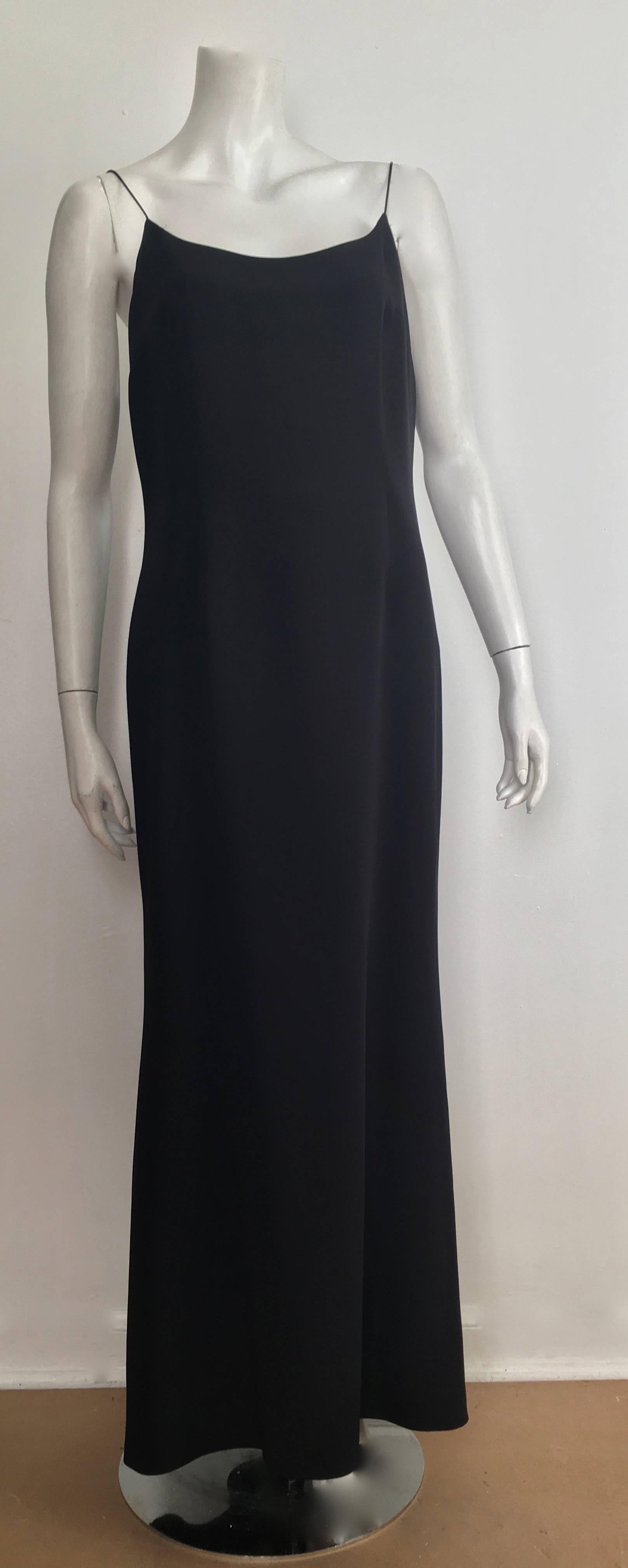 Naeem Khan black silk slip spaghetti strap evening maxi dress is a size 12. The simplicity of this dress is timeless and will provide any woman with the 'WOW' factor.  Ladies you can wear your gorgeous vintage Donna Karen long sleeve bodysuit that