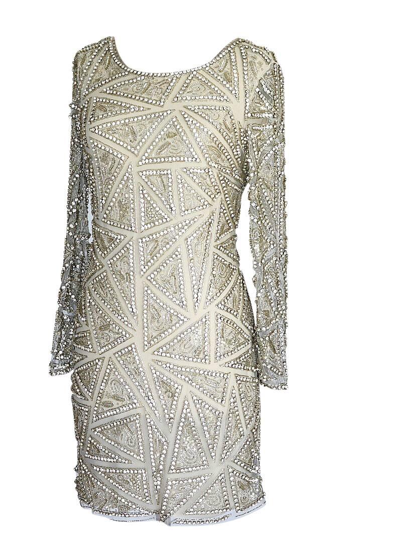 Guaranteed authentic Naeem Khan stunning embellished dress.        
Magnificent extensive large diamantes forming triangular shapes with delicate silver pailletes and beading inside.
All beading is set onto a neutral sheer netting.
The nude lining