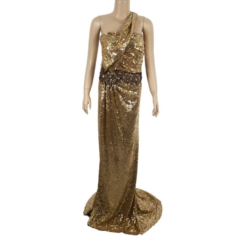 Elegantly worn by Ivanka Trump, Faith Hill, and J. Lo, Naeem Khan's designs always land at the top. Adorned with golden sequins, this gown will shine in the middle of a crowd. It features an asymmetric strap and an uneven skirt, giving it an edge.