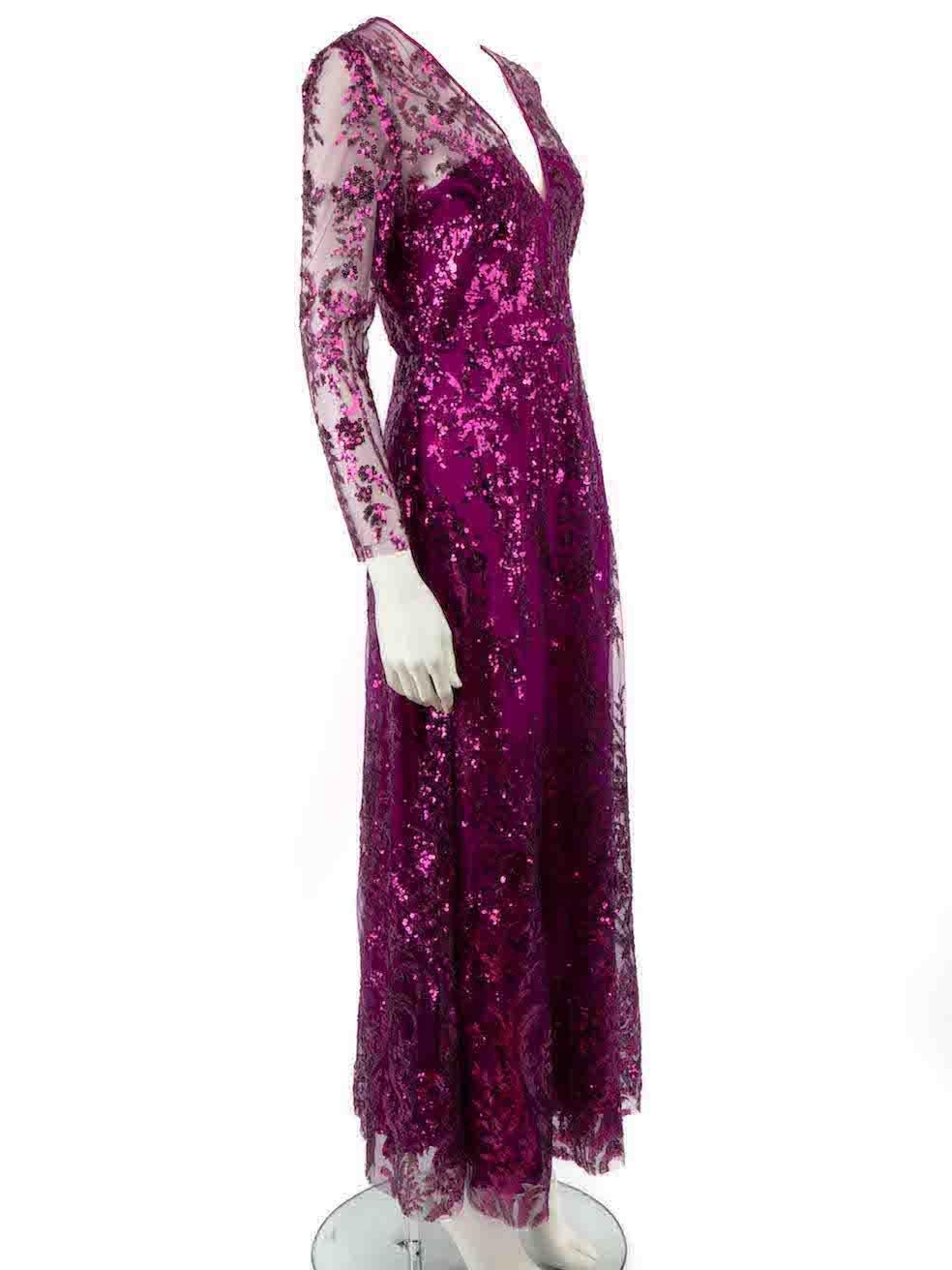 CONDITION is Very good. Minimal wear to dress is evident. Minimal wear to the lining with plucks to the weave of the silk at the front and back on this used Naeem Khan designer resale item.
 
 Details
 Purple
 Nylon tulle
 Gown
 Long sleeves
