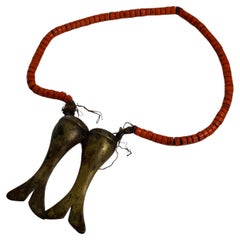 Collier trophée Naga Konyak à double queue de poisson