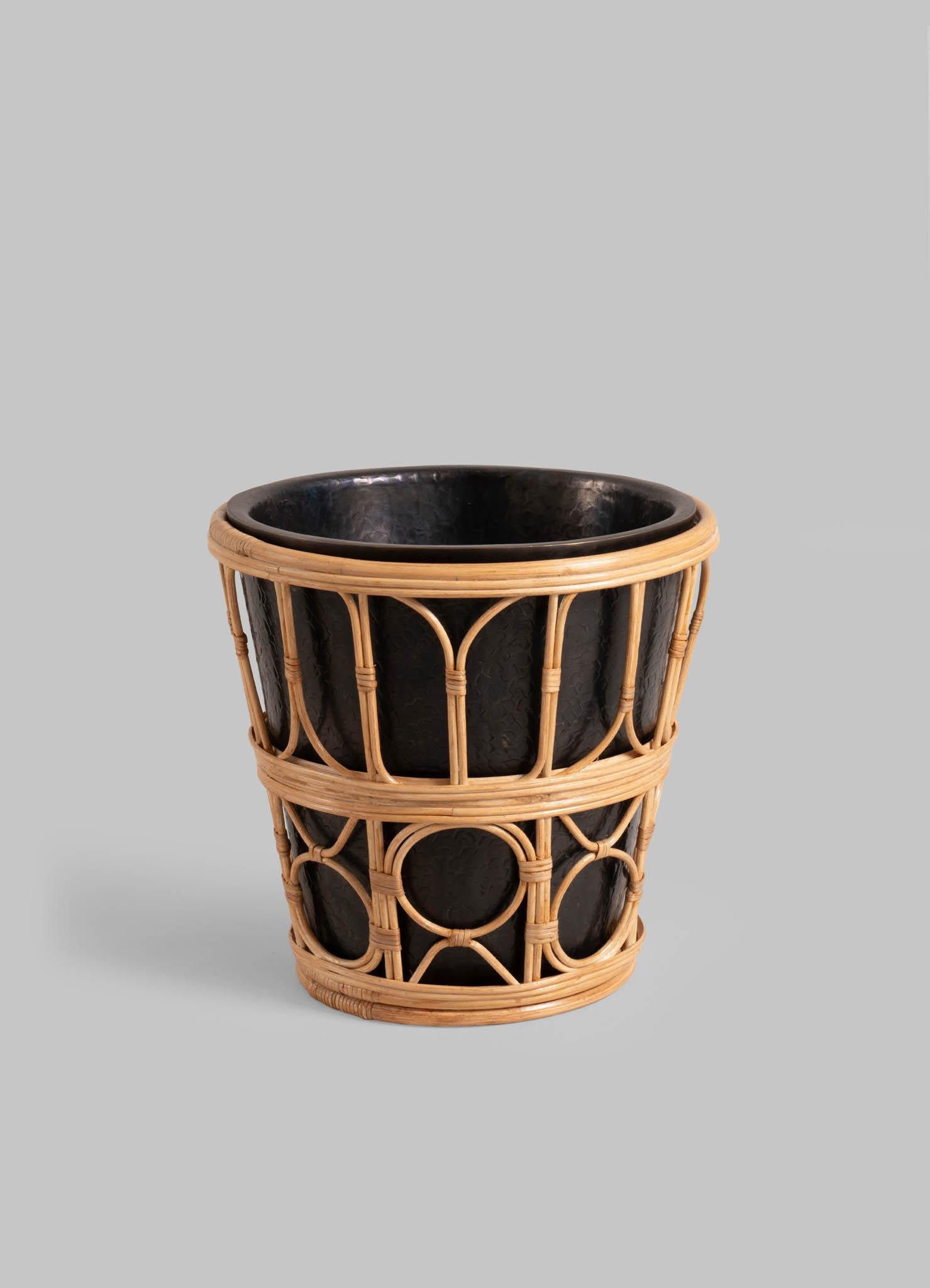Nagaland Champagne Bucket in Brass and Cane, Viya By Vikram Goyal

A classic pairing, reimagined. Robust cane becomes latticed second skin to the hand-beaten brass objects in an effortless collaboration. These barware accessories are crafted as