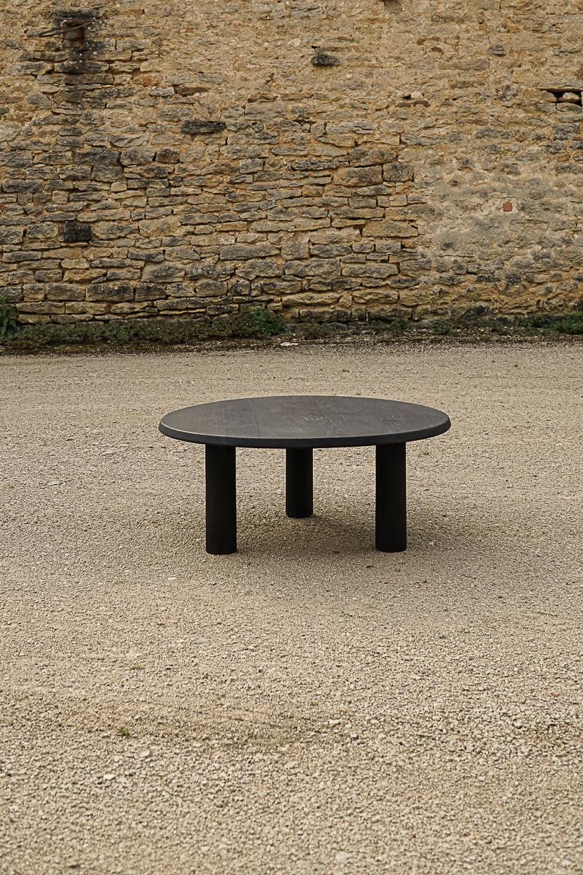 Nahele Small Burnt Oak Table by La Lune
Dimensions: Ø 80 x H 30 cm.
Materials: Solid Oak.

Oiled solid burnt oak. Local wood. Produced in France. Custom sizes available.  Available in varnished solid oak. Also available in a bigger size (Ø 105 x H