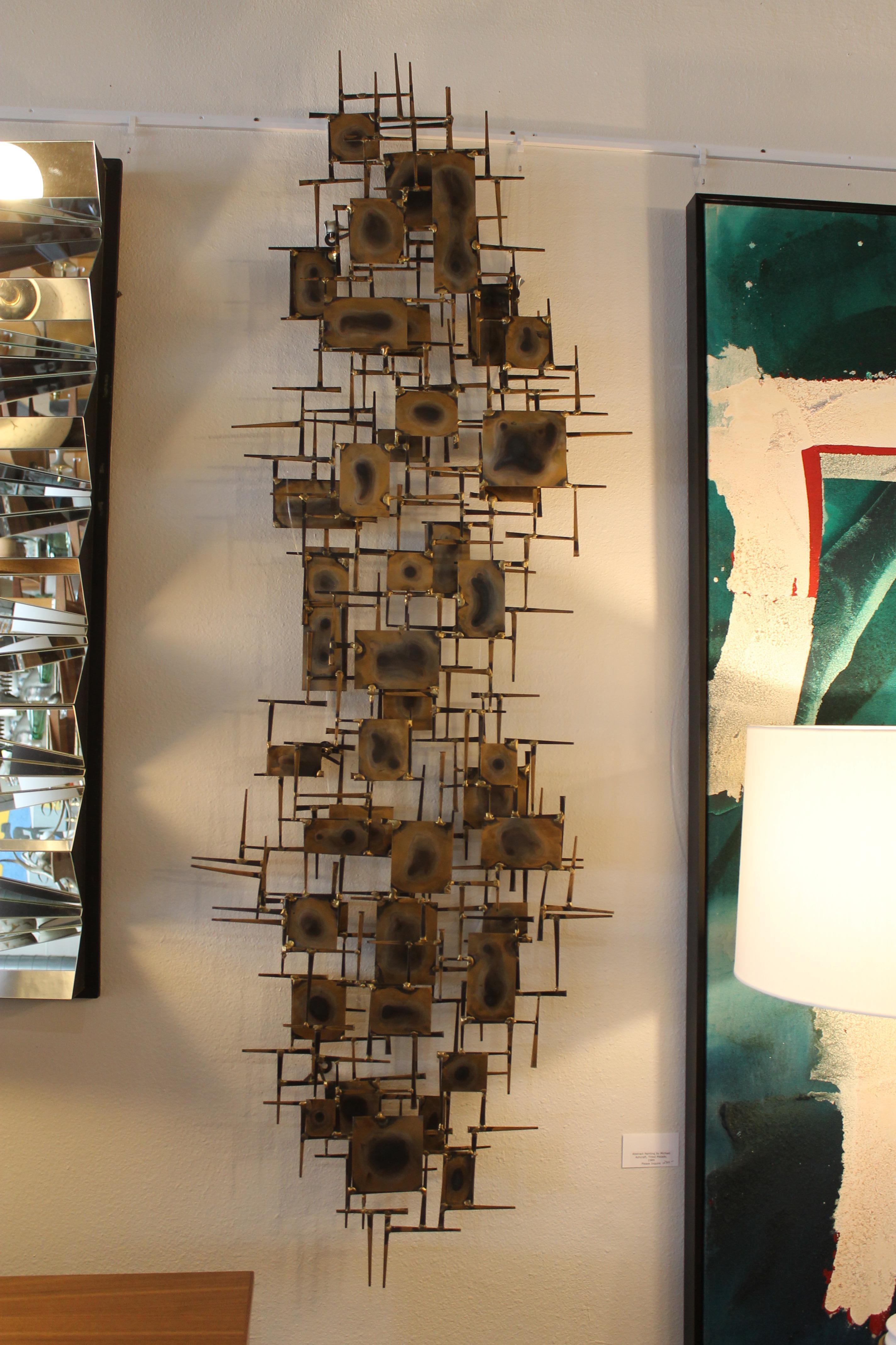 Nail and brass painted steel wall sculpture. Reminiscent of Jere sculptures. Sculpture measures: 26