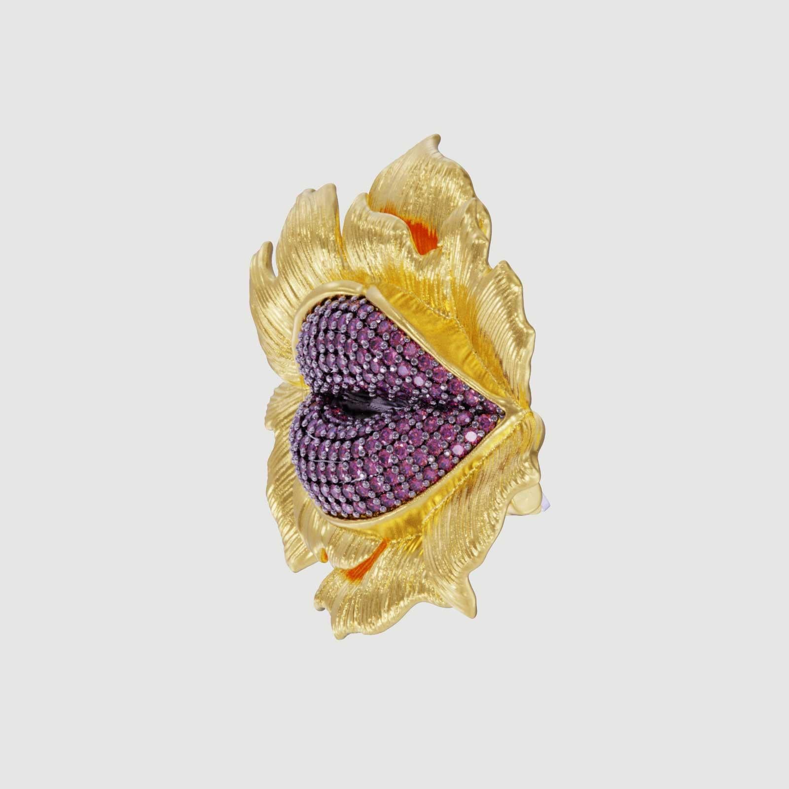  Introducing our mesmerizing Flower Lips Brooch!  These stunning accessory is a fusion of surrealism and pop-art, designed to make a bold statement wherever you go. 

Crafted with love and attention to detail, each earring features a delicate flower