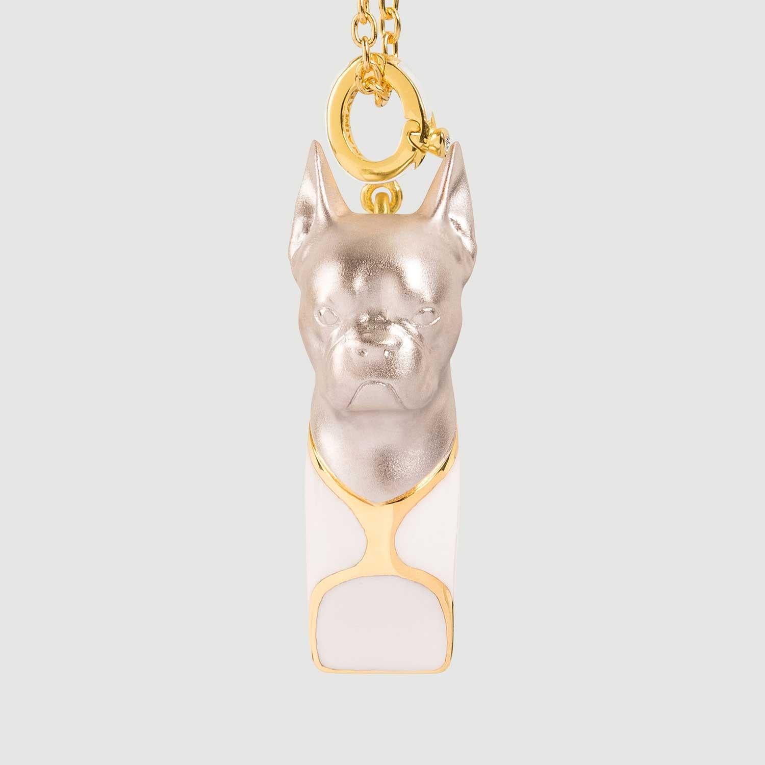 This French Bulldog Necklace features a design inspired by Georges Hilbert's renowned French Bulldog sculpture and boasts an alluring, contemporary tribute to Victorian-era dog whistles, also known as 