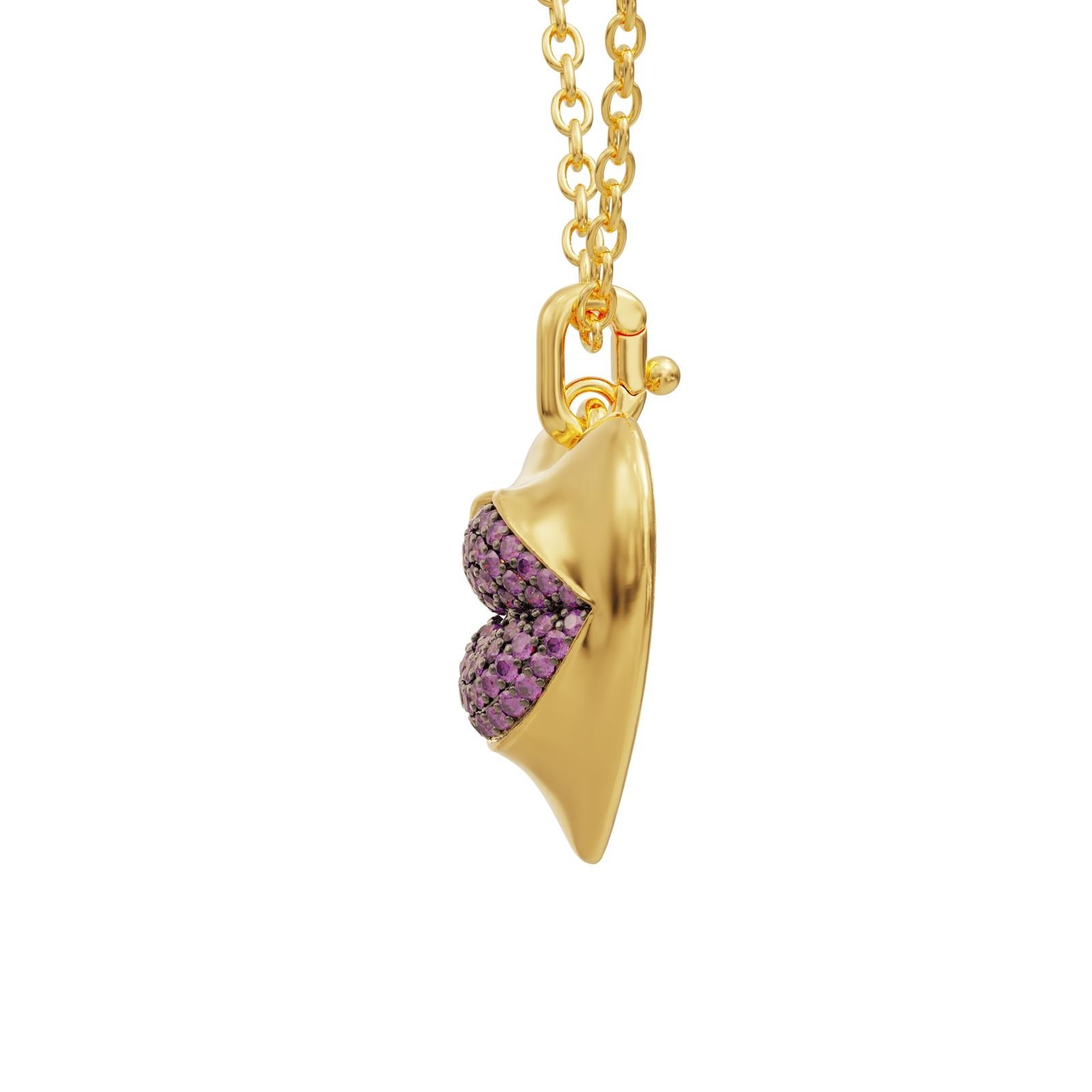 Introducing our stunning gold vermeil heart pendant necklace, a must-have for any fashion-forward woman looking to add a touch of elegance and sophistication to her jewelry collection. Crafted with the finest materials and adorned with a dazzling