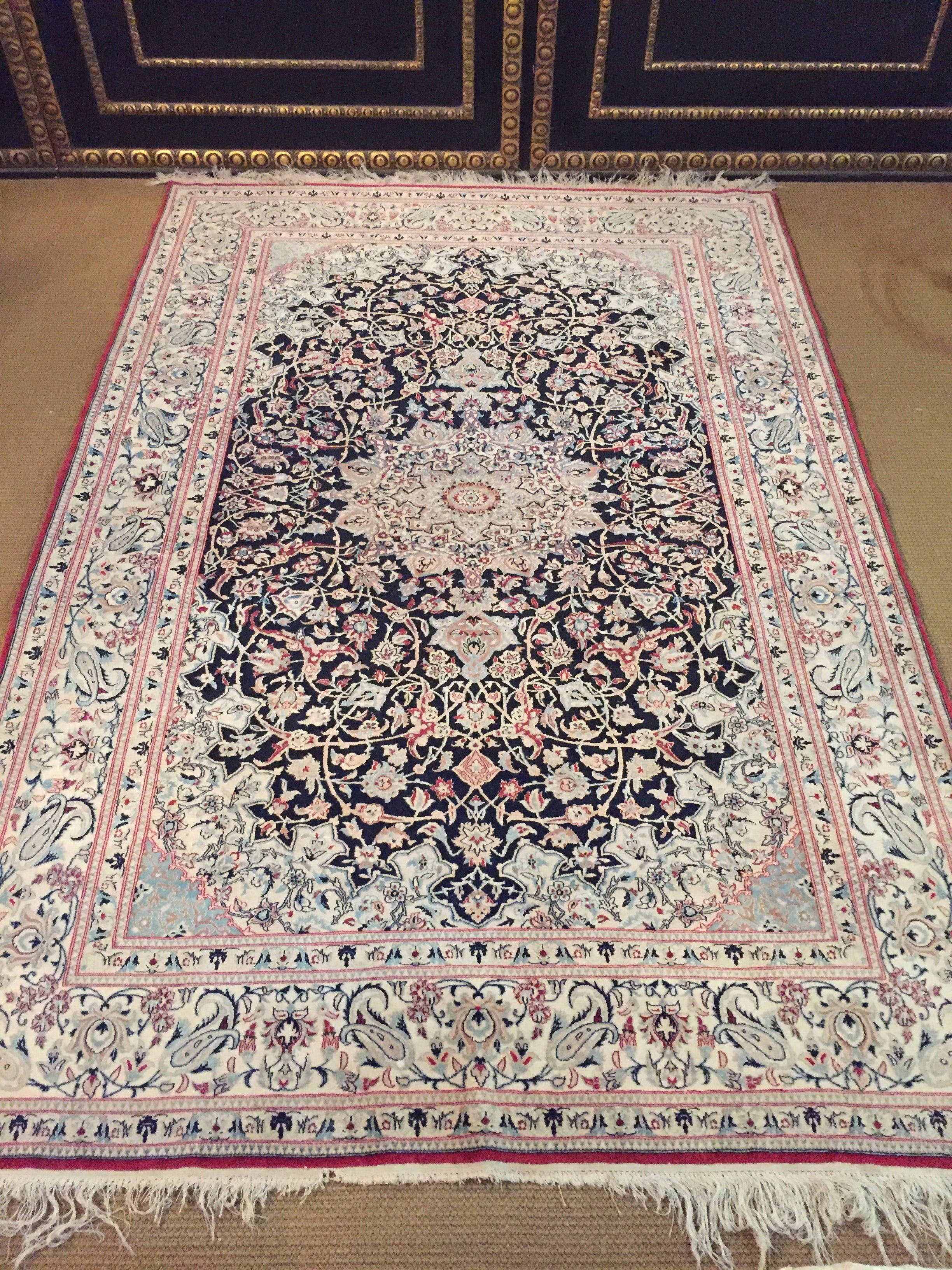 A hand knotted, oriental carpet unfolds a unique effect in any room, whether on stone or wooden floor, this carpet will delight you for decades every day. This rug was elaborately knotted by hand and represents a great piece. The excellent knotting