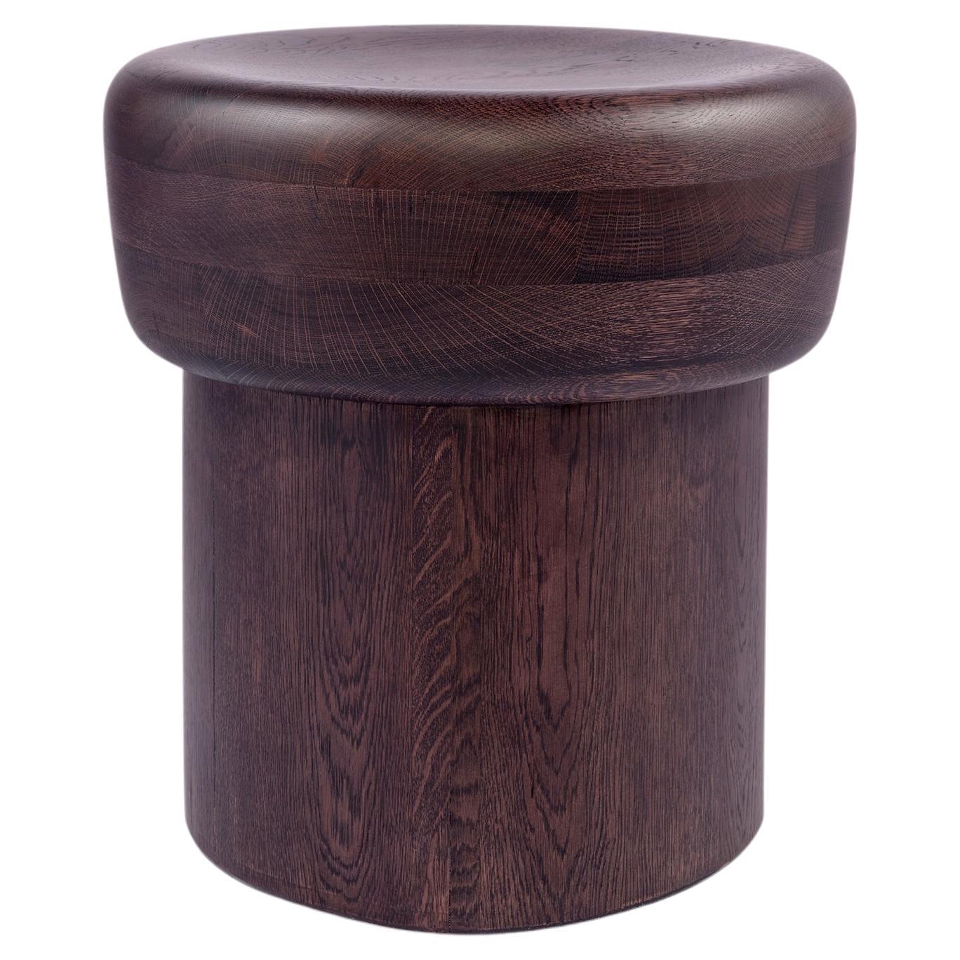Sgabello Nairobi - Misura L, lavorazione in legno massiccio con un design scultoreo e audace