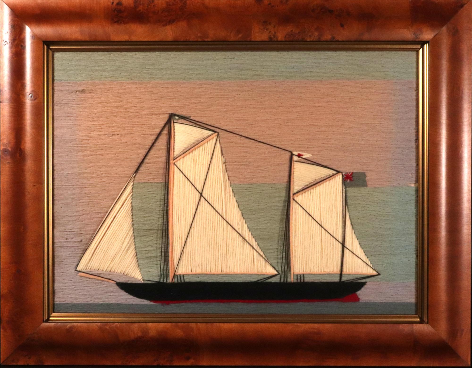 British Sailor's Woolwork of a Two-masted Schooner,
CIRCA 1875

Die naive Seemannsarbeit zeigt die Backbordansicht eines Zweimastschoners unter Segeln. Der Rumpf in Schwarz und Rot und die Segel in weißer Wolle. Sie führt eine blaue Fahne an ihrem