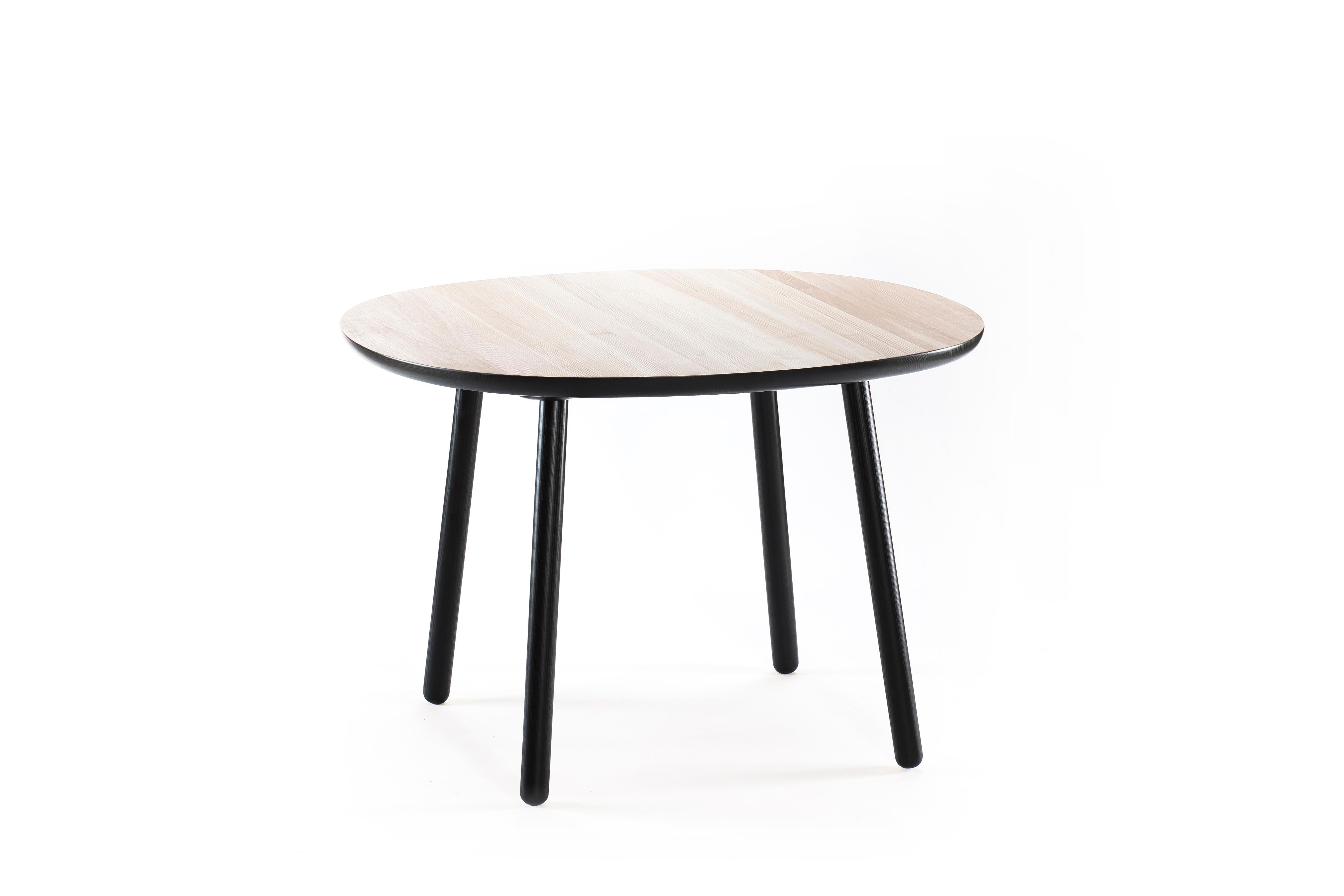 Table's modest and clean form is decided by a simple but lasting construction - each leg has its own base under the tabletop making the table strong enough to serve generations to come. The roundish tabletop contour is designed to create an inviting