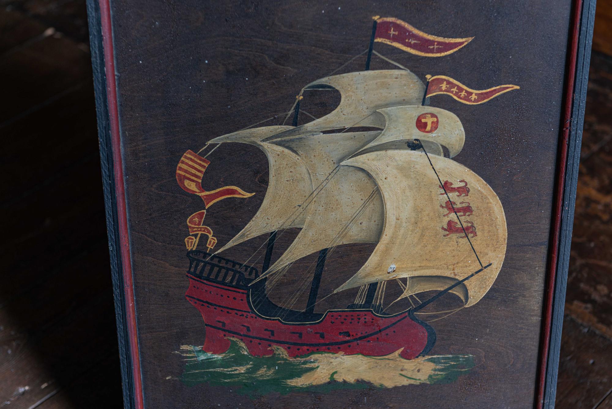 Naive oil on board English Galleon Ship painting
circa 1910.

Decorative oil painting on board of an English galleon with three lions on the sail - affixed to an easel stand. Great color and craquelure patination.

Measures: 63 H x 46 W x 2 D