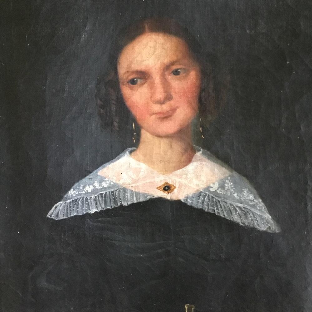 A captivating portrait painting of a beautiful and demure, young woman.
19th century, French, oil on canvas portrait painting in a gilt frame.
The painting has stable paint with crazing to the paint surface and some small pinholes. There is an