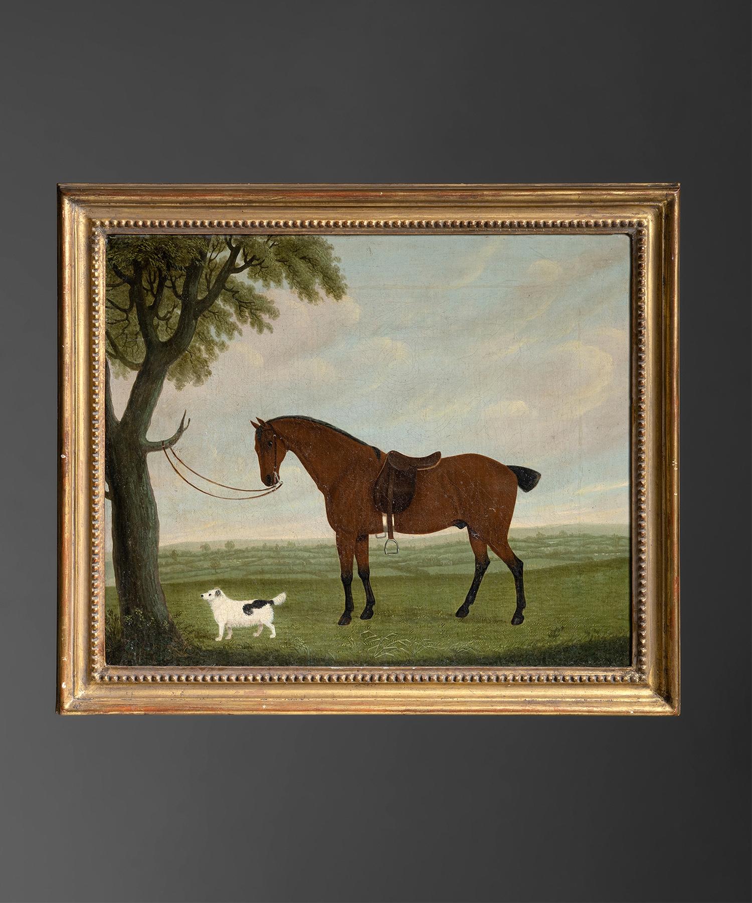 Naive Portrait of a Saddled Bay Horse

England circa 1790

Oil on canvas painting of a horse and terrier in carved and gilded frame.

Measures: 24