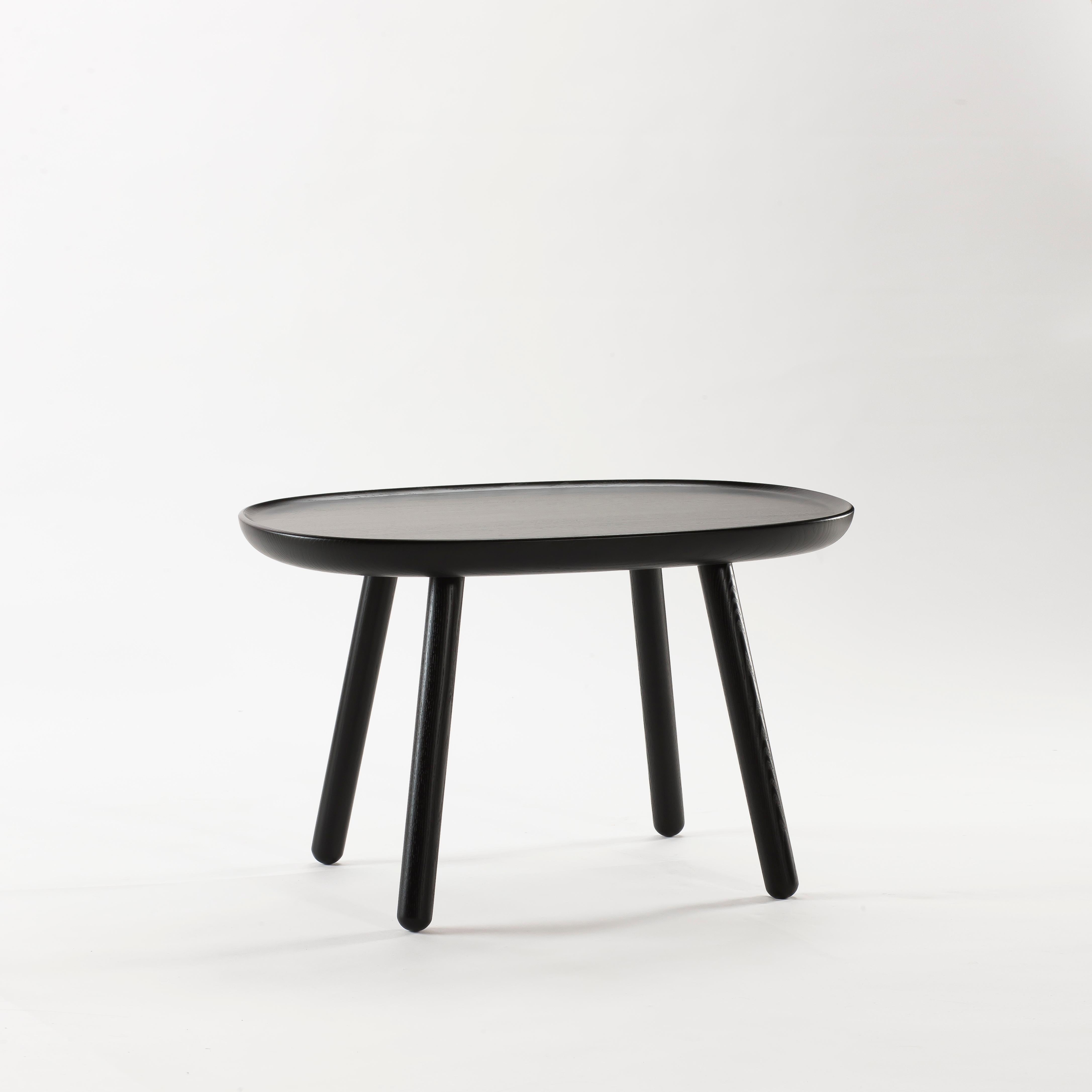 Naïve side tables are available in three sizes, each carved out of a single piece of solid ash. A form in between a square and a circle creates a soft and welcoming appearance and will easily adapt to any type of room. The tables can be easily