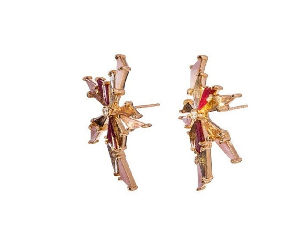 With their playful design, hint of sparkle, and feminine combination of colors, these Nak Armstrong earrings have a flirty sophistication. The hand-cut angular stones of labradorite, andalusite, peach opal, peach tourmaline and ruby are set in 20k