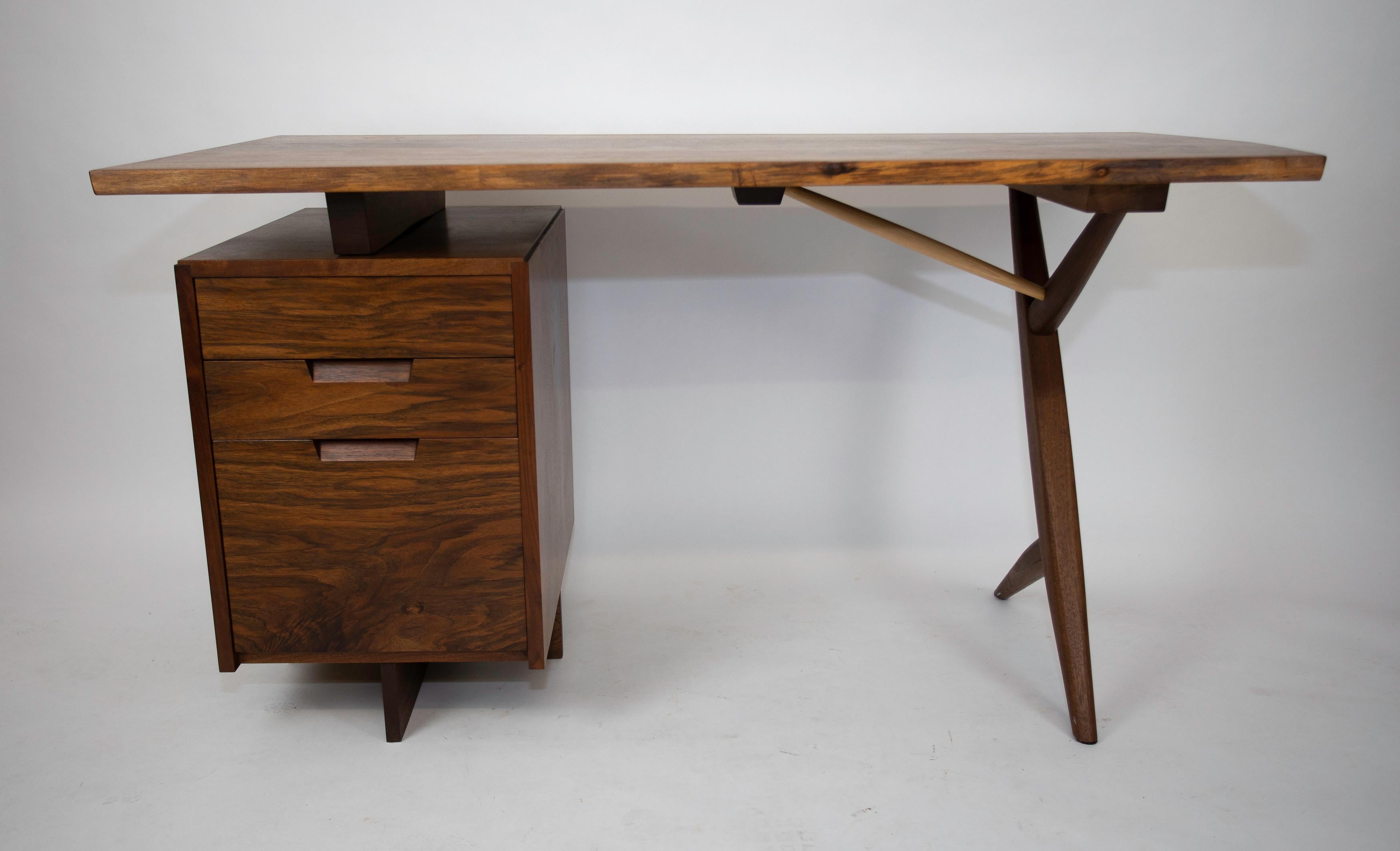 Nakashima Studios Conoid Desk
Commissioned in 2000 for the Davidson Family
Wonderful selection of wood
Signed Mira Nakashima and Dated, clients name 
Original Surface.