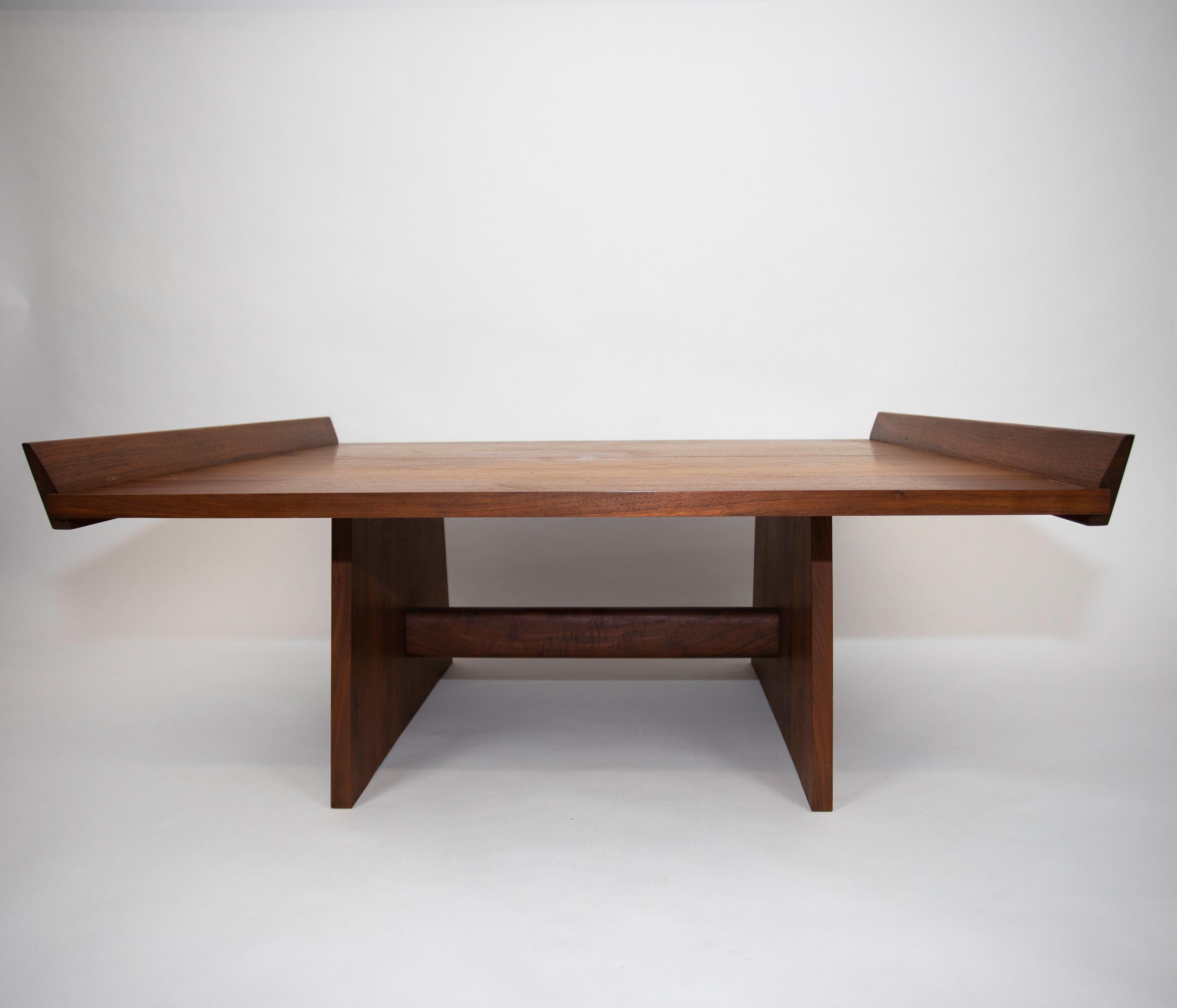 A Nakashima Studios Milkhouse table
Walnut with a rosewood butterfly
Great original surface
Signed Mira Nakashima with client's name below.