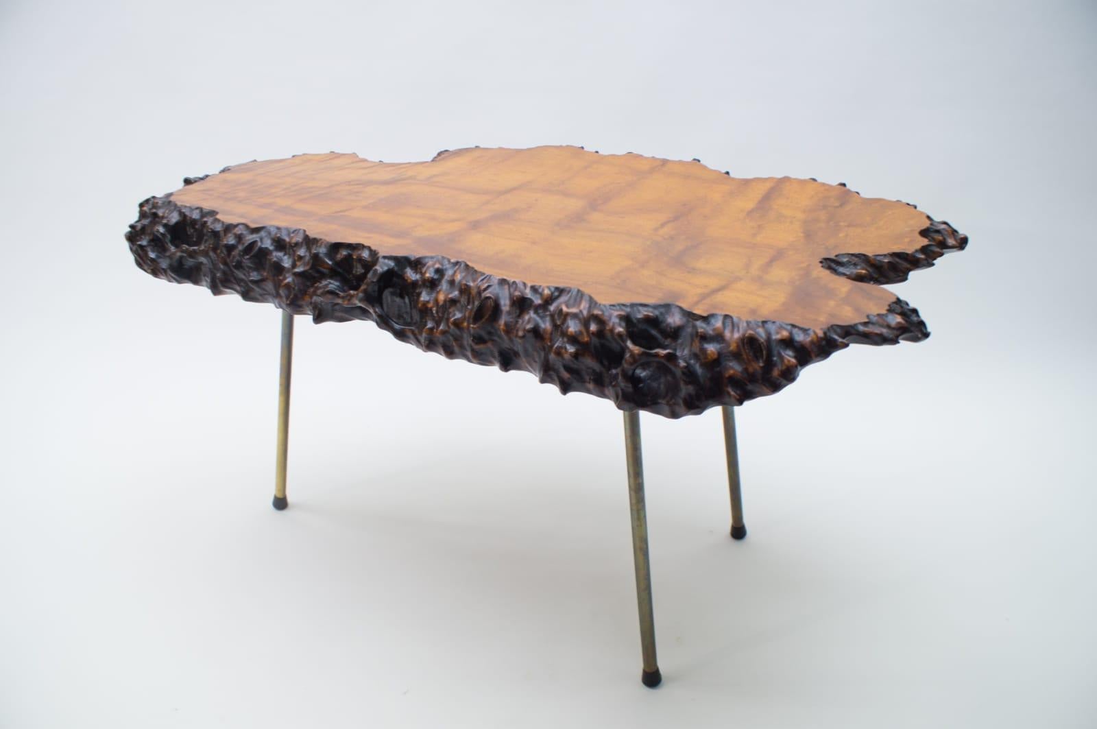 Wonderful side table in the style of Auböck and Nakashima, gorgeous burl woodwork and tripod brass legs.
  