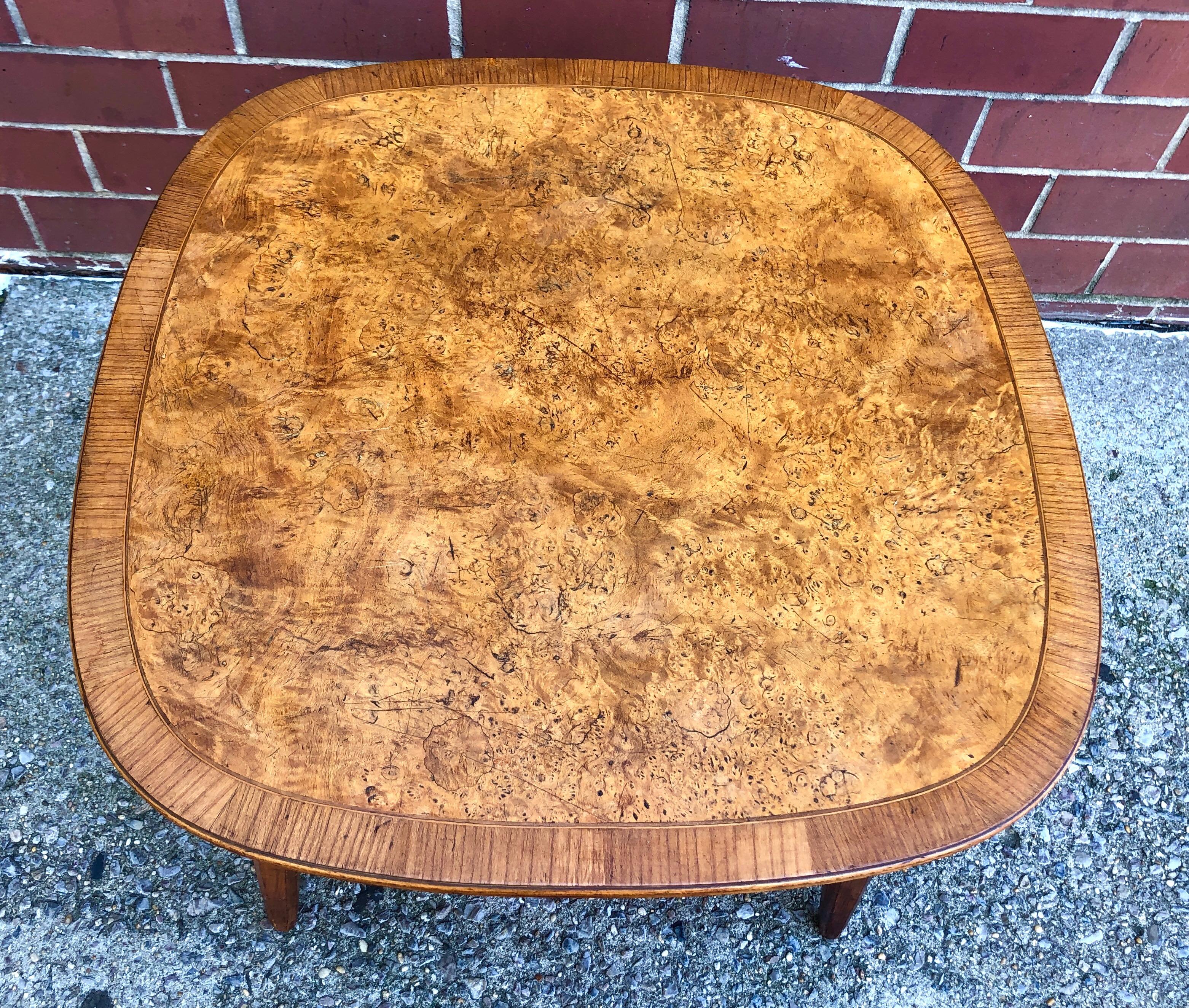 American walnut occasional or lamp table with burl maple inlaid top and hickory edge, circa 1957. Nice architectural details like exposed supports and octagonal carved legs. Unmarked and possibly custom made, although very similar to George