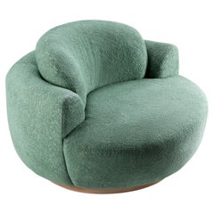 Fauteuil nu avec tissu vert huile et base en bois naturel