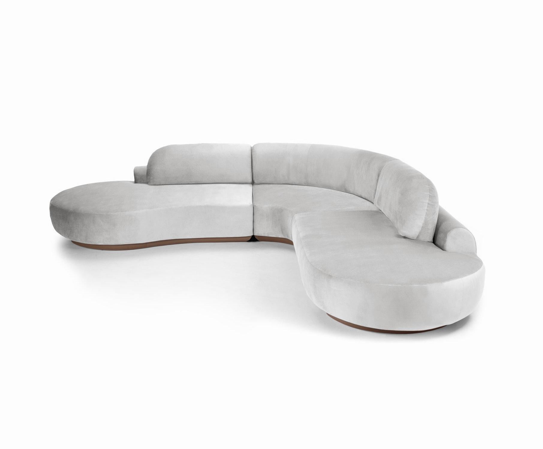 Il divano componibile Naked è un divano modulare con curve invitanti e una seduta confortevole. Realizzato a mano con una base in legno massiccio. Il divano componibile Naked è disponibile in diversi materiali, finiture e