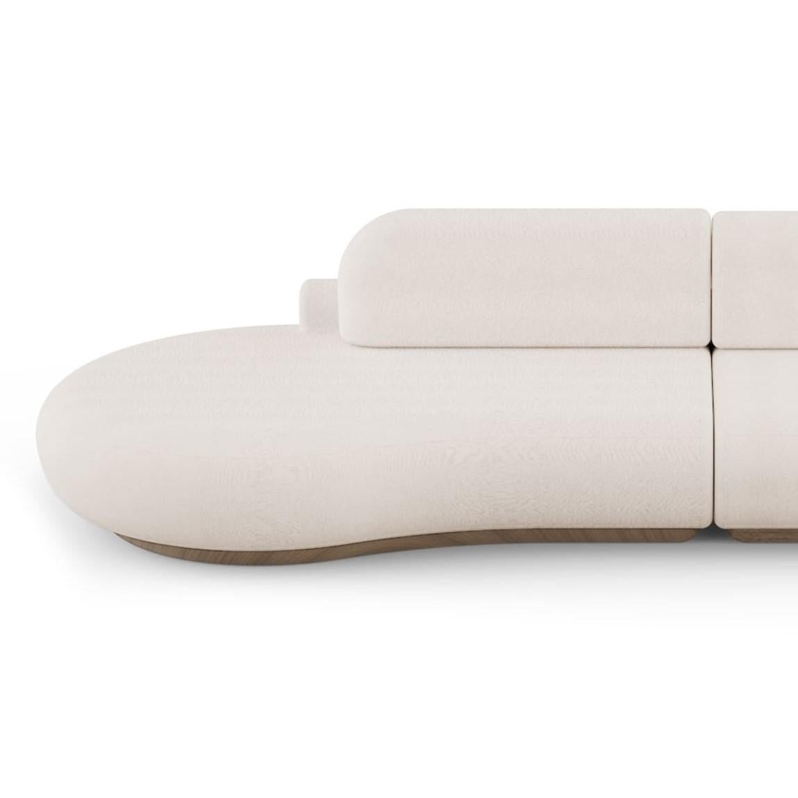 Naked sofa by Dooq
Dimensions: W 352 x D 132 x H 78 cm
Seat height 40 cm
Materials: Base beechwood
Upholstery smooth velvet
Also available in synthetic leather  

Naked sofa reveals sculptural and organic shape meant to embrace the user and