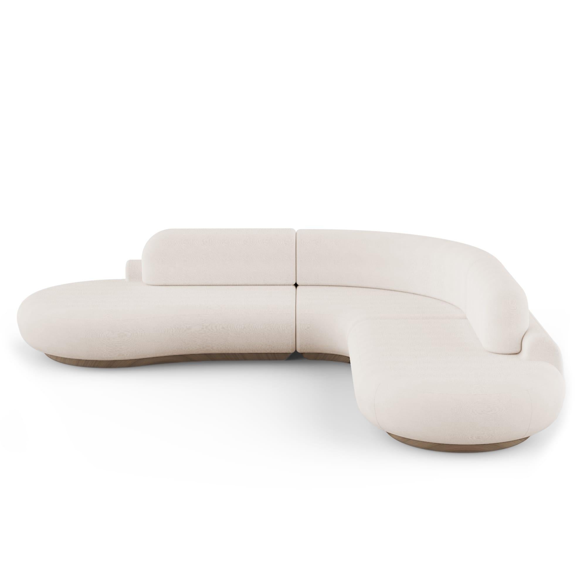 Naked Sofa by Dooq
Dimensions: W 312 x D 332 x H 78 cm.
 Seat height 40 cm.
Materials: base beechwood.
 Upholstery smooth velvet 
 Also avalaible in synthetic leather.

Naked sofa reveals sculptural and organic shape meant to embrace the user and