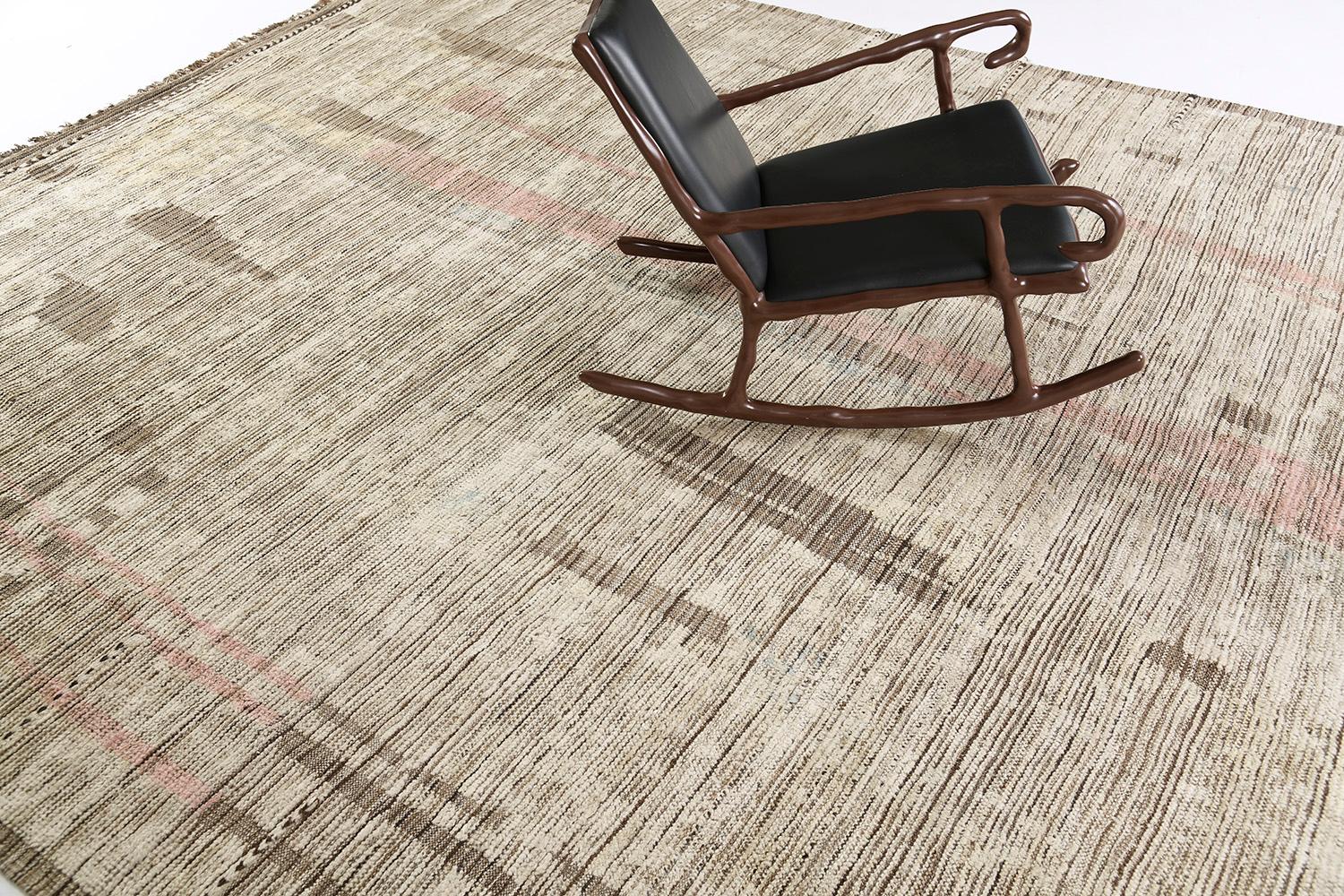 Nakhla is a natural earth-toned rug and a modern interpretation of the Moroccan world. These rugs' irregular patches of brown, ivory, and salmon red resemble the fibers of nature and their ability to be used for crafts such as cords and basketry.