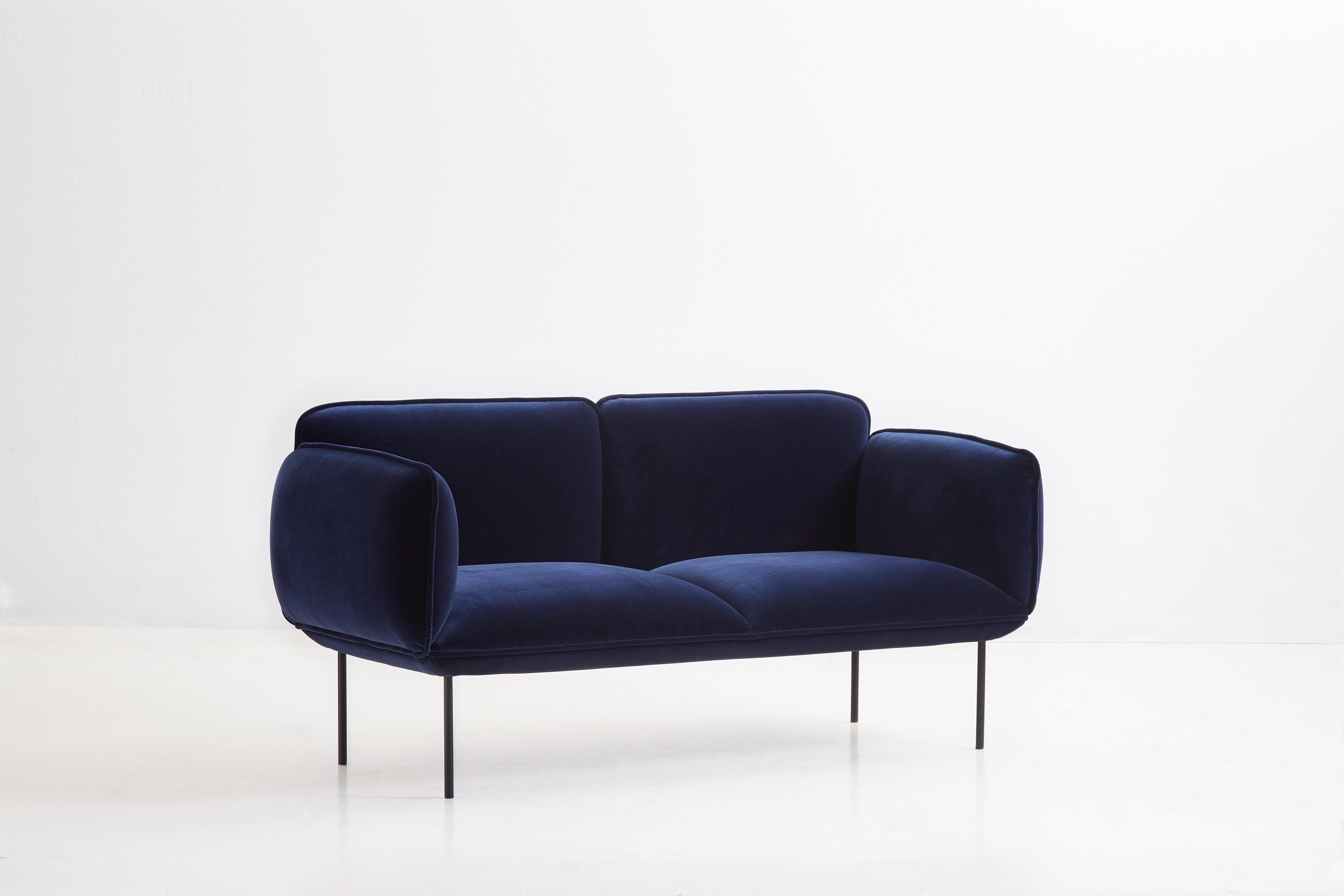Nakki seater 2 by Mika Tolvanen.
Materials: Foam, plywood, elastic belts, memory foam, fabric (Harald 3, 0182).
Dimensions: D 78 x W 180 x H 83 cm.
Also available in different colours and materials.

The founders, Mia and Torben Koed, decided