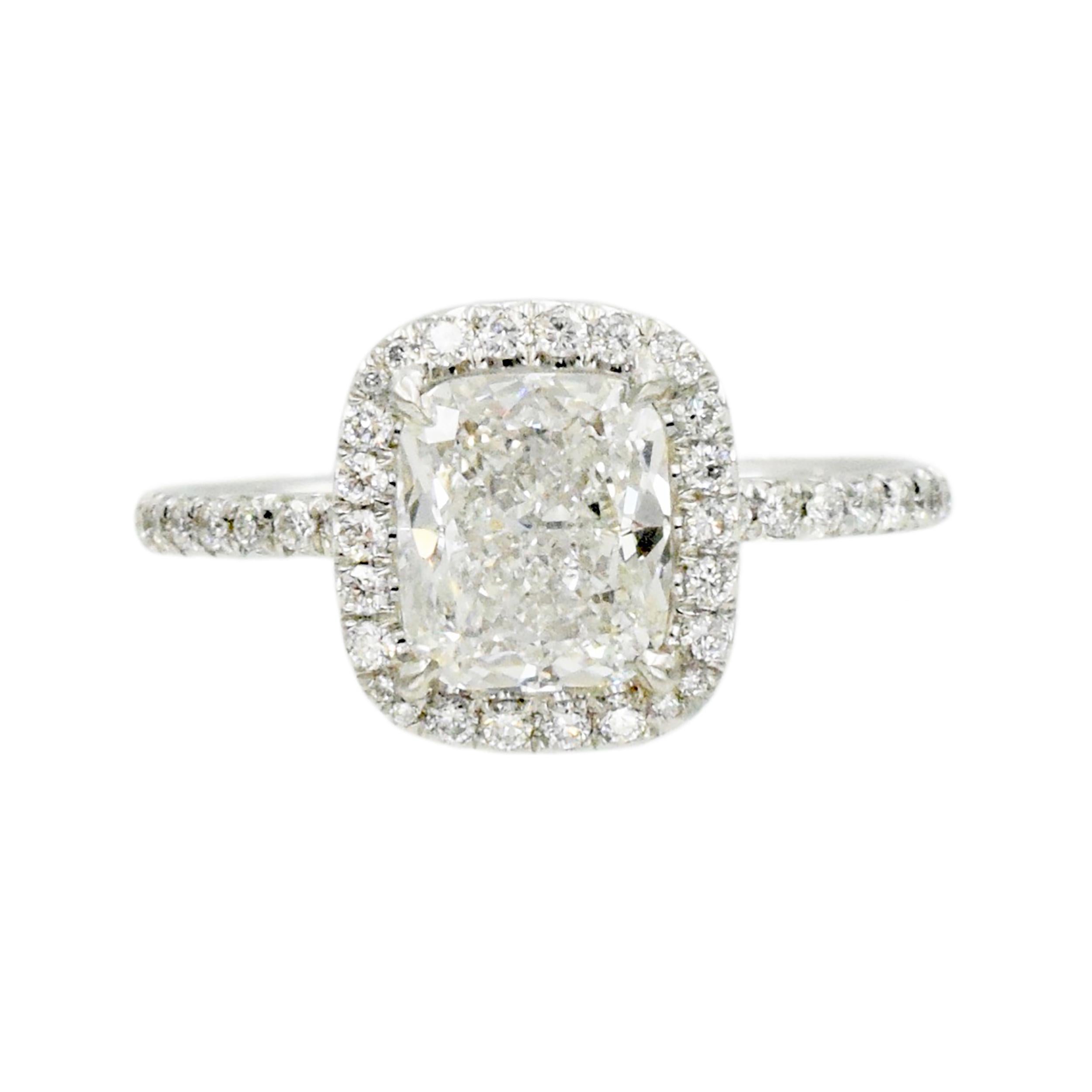Solitaire with accents engagement ring made in platinum. Pave-set 66 round brilliant cut diamonds total weight 0.45ct, center stone: 1.92ct cushion modified brilliant cut diamond, color: E, clarity: VS1, GIA# 2136629262, surrounded by diamond pave