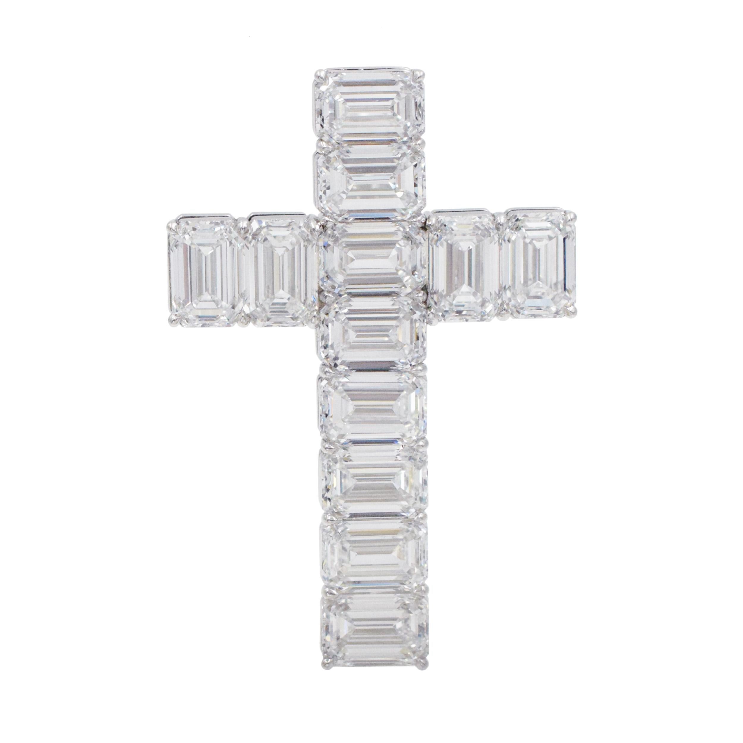 GIA certified Diamond and Platinum Cross Pendant This cross has 12 emerald cut diamonds with total weight of 10.89 carats (Color: D-F, Clarity VVS1-VS2, All GIA Certified) all set in platinum, with a bail on the back. One a black code necklace