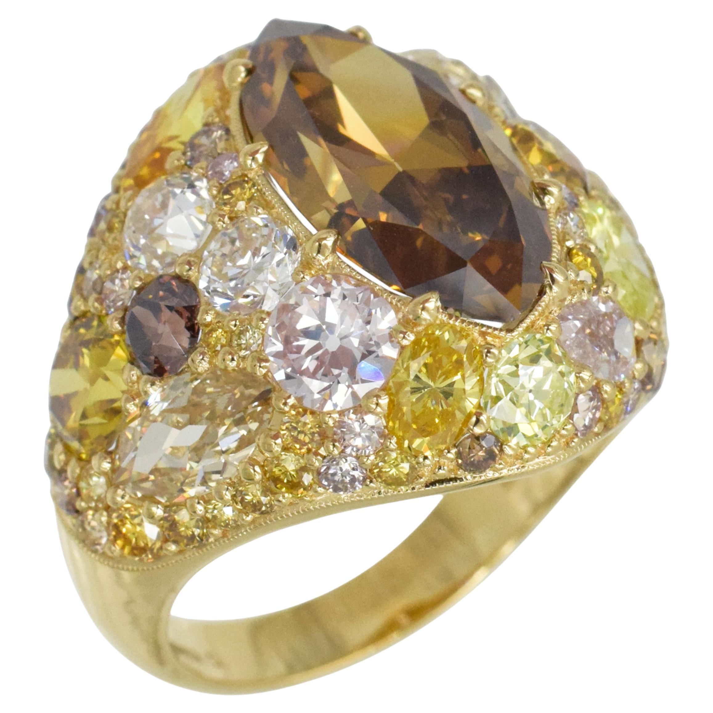 GIA certified Colored Diamond Ring. This bombe style ring has with a center diamond of 4.28 carat marquise shape. diamond with GIA Certificate color: Fancy Deep Brown-Orange, Clarity:VS2 set in 18k yellow gold.

The setting has 55 yellow round