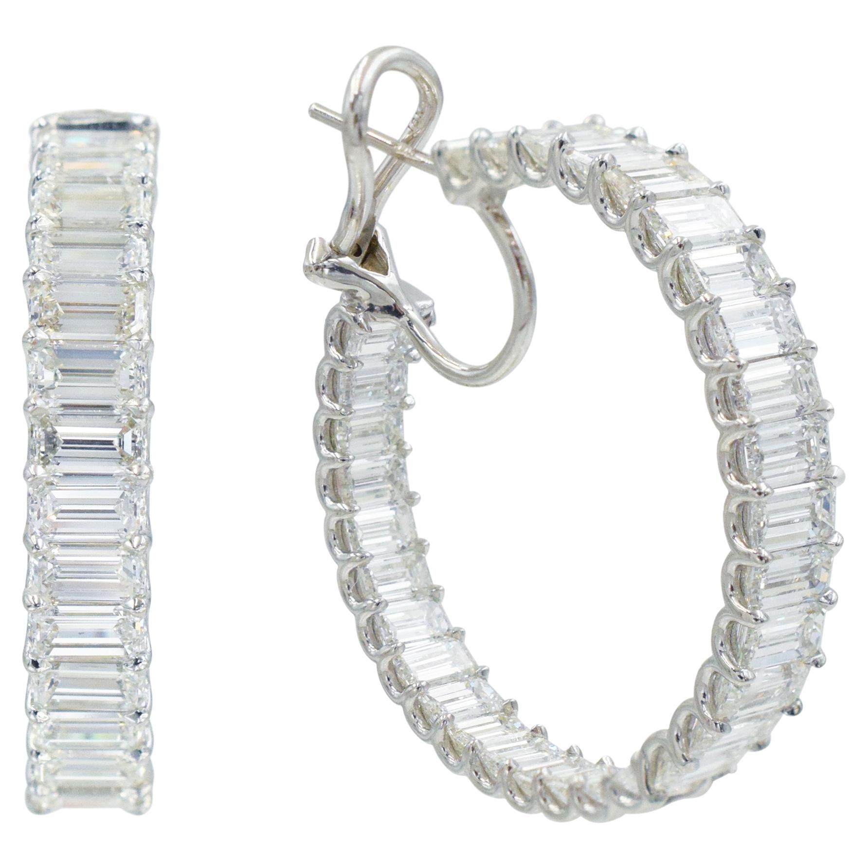 18.78ct Diamond Inside-Out Hoop Earrings in 18k white gold. The earrings consist of 64 emerald
cut diamonds 