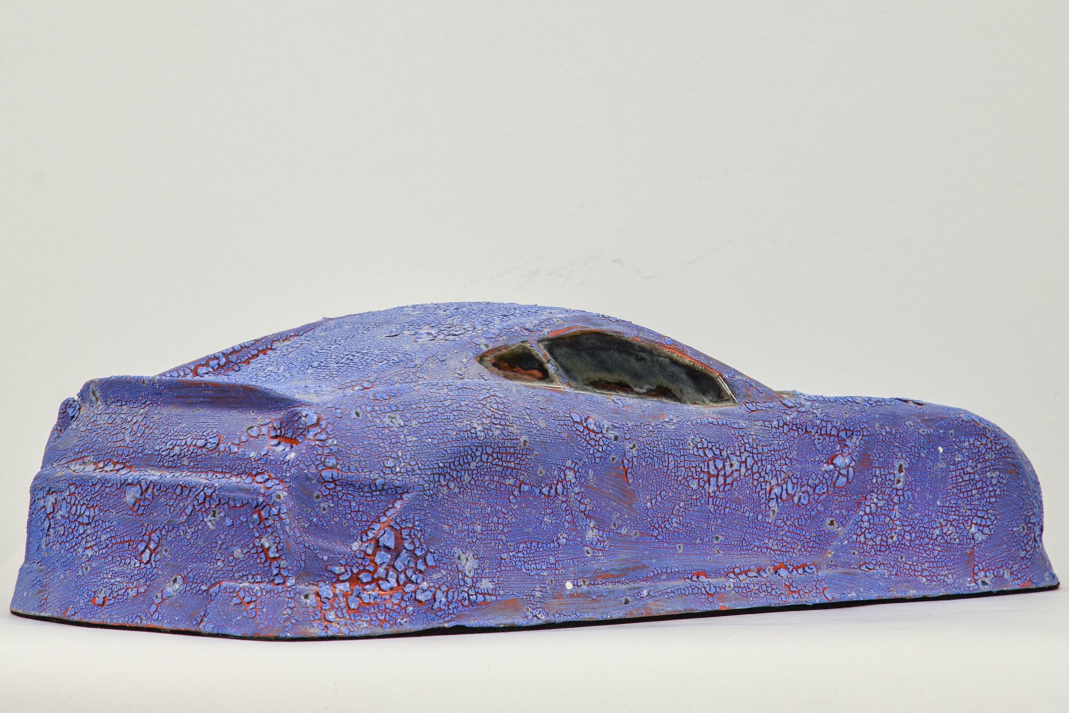 Crawl Not Wheels by Nam Tran (b. 1988 - )

Ceramic with crawl and metallic glaze
10.5 x 17.2 x 39.8 cm (4 ¹/₈ x 6 ³/₄ x 15 ⁵/₈ inches)
Initialled and numbered 1/1 on the base
Executed in 2019

Provenance 
Studio of the Artist, London

This work is