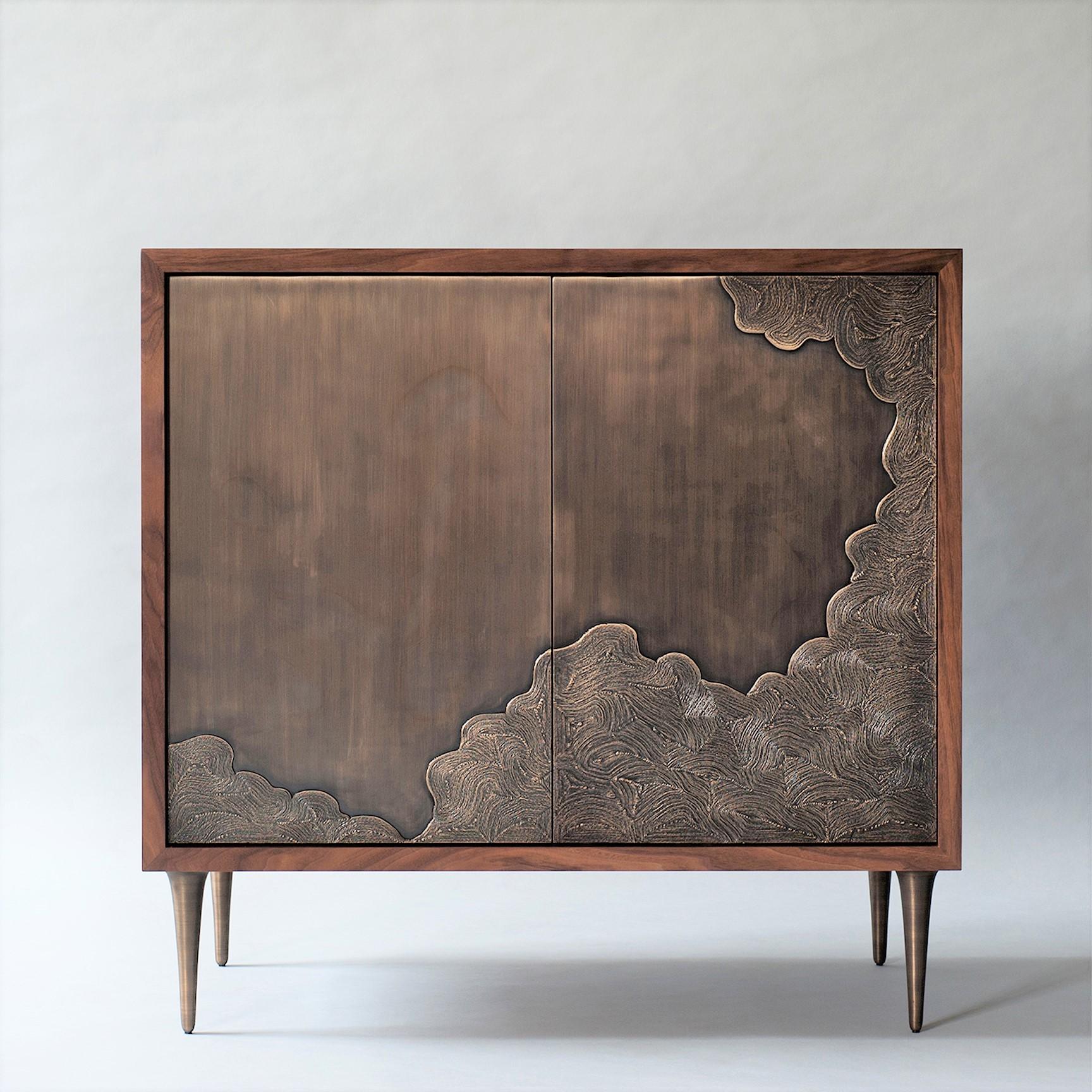 Named after the Japanese word for wave, the Nami Collection showcases bronzework in the form of swelling surf. The two-door cabinet’s richly textured, push-to-open fronts were cast using coiled thread—a nod to the ancient Dhokra creations of nomadic